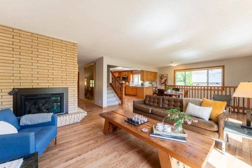 Measuring 22 x 15 ft, the spacious living room is currently arranged as a conversation area with informal dining, but its versatile layout can easily adapt to fit your needs.