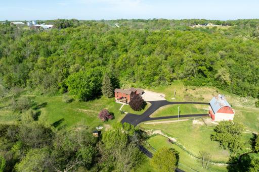The property features a spring-fed creek with year-round flowing water.