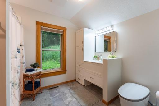 The bathroom window looks to the backyard.