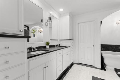 Luxurious Primary Bath with dual vanity and lots of storage.