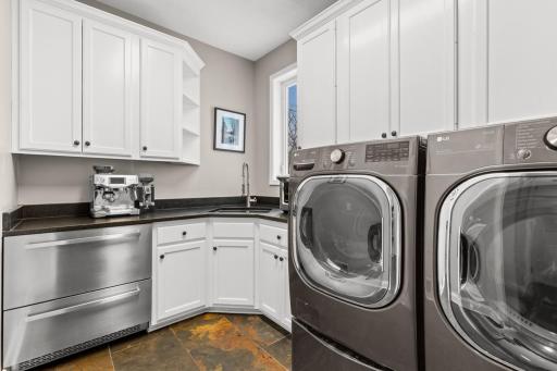 New Washer and Dryer - New small refrigerator pictured on left.