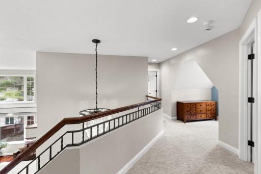Upper Level Hallway overlooks living area.