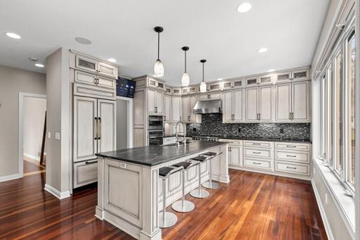 Spacious Kitchen with lots of storage and large center island perfect for morning coffee.