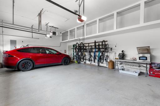 Heated Garage - EV Charger for two cara stalls - Wall mounted 10 bike rack.
