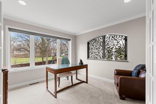 Sitting room opens up to view the main floor living room.
