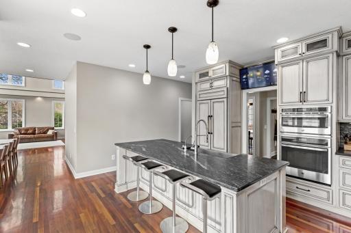 Kitchen opens up to dining area and living room.