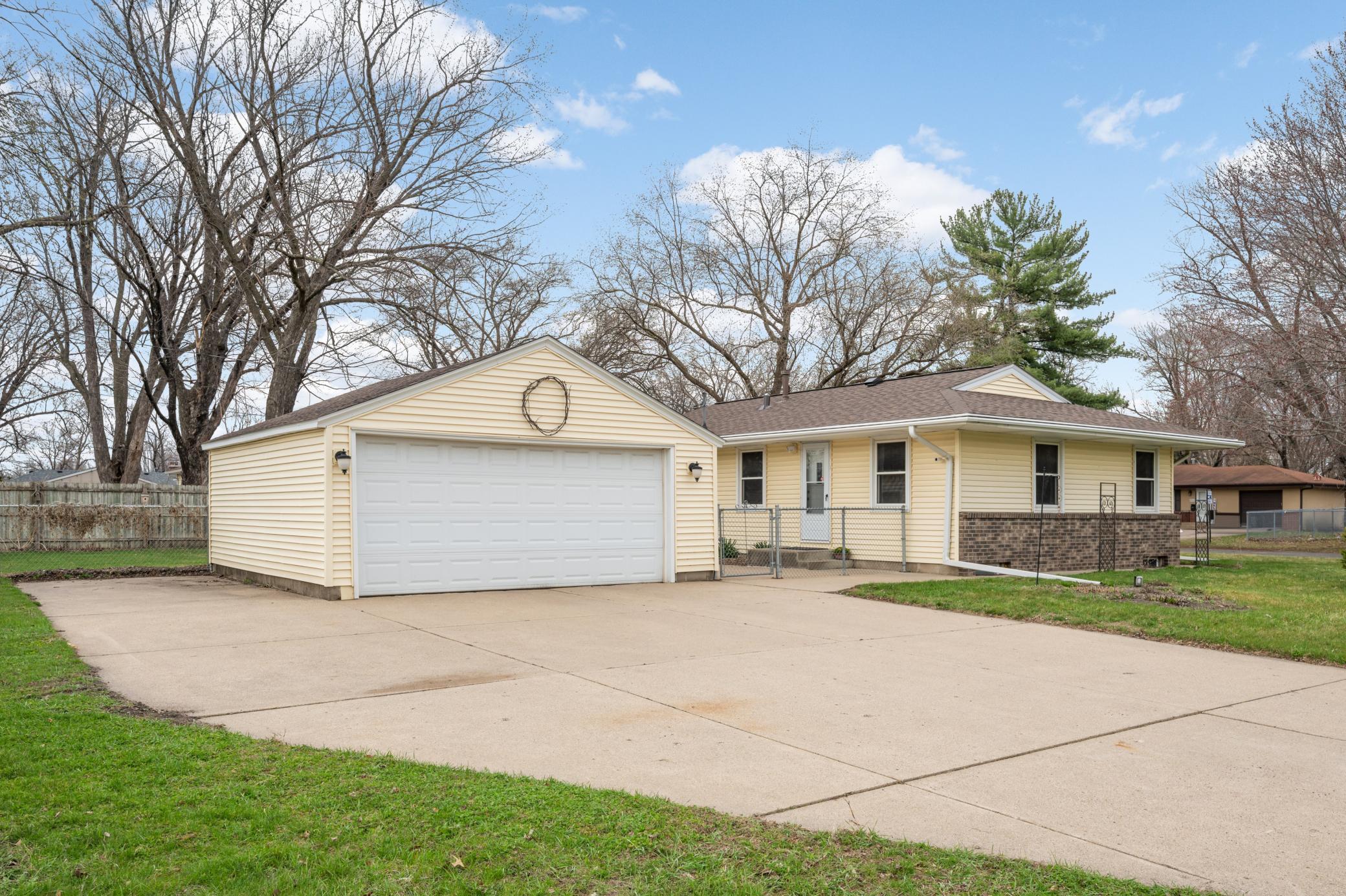 Large Concrete Driveway with/ 2-Car Garage