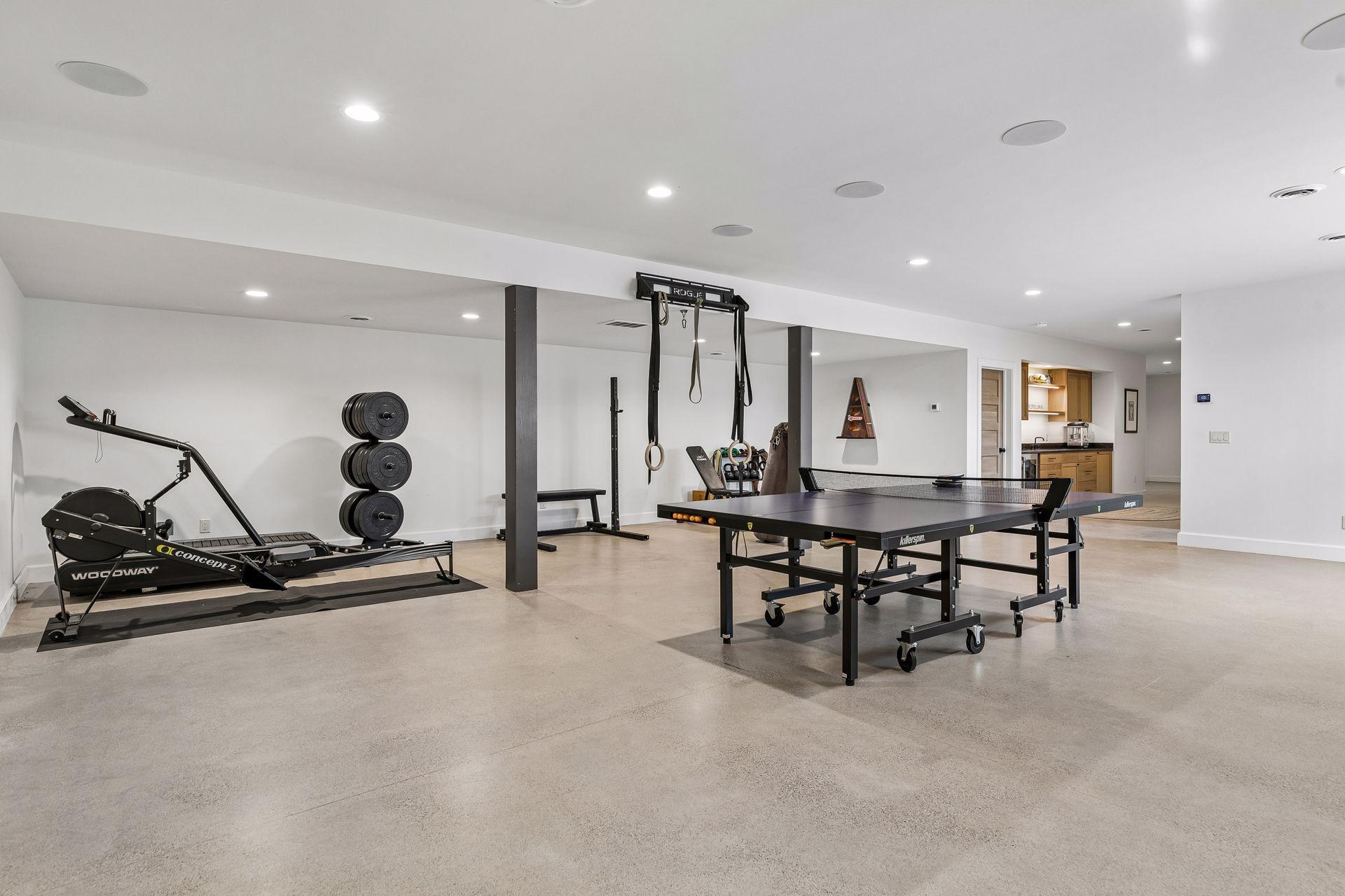 Massive lower level family room! Versatile space complete with recessed lights, heated cement floor, wet bar and lookout windows.