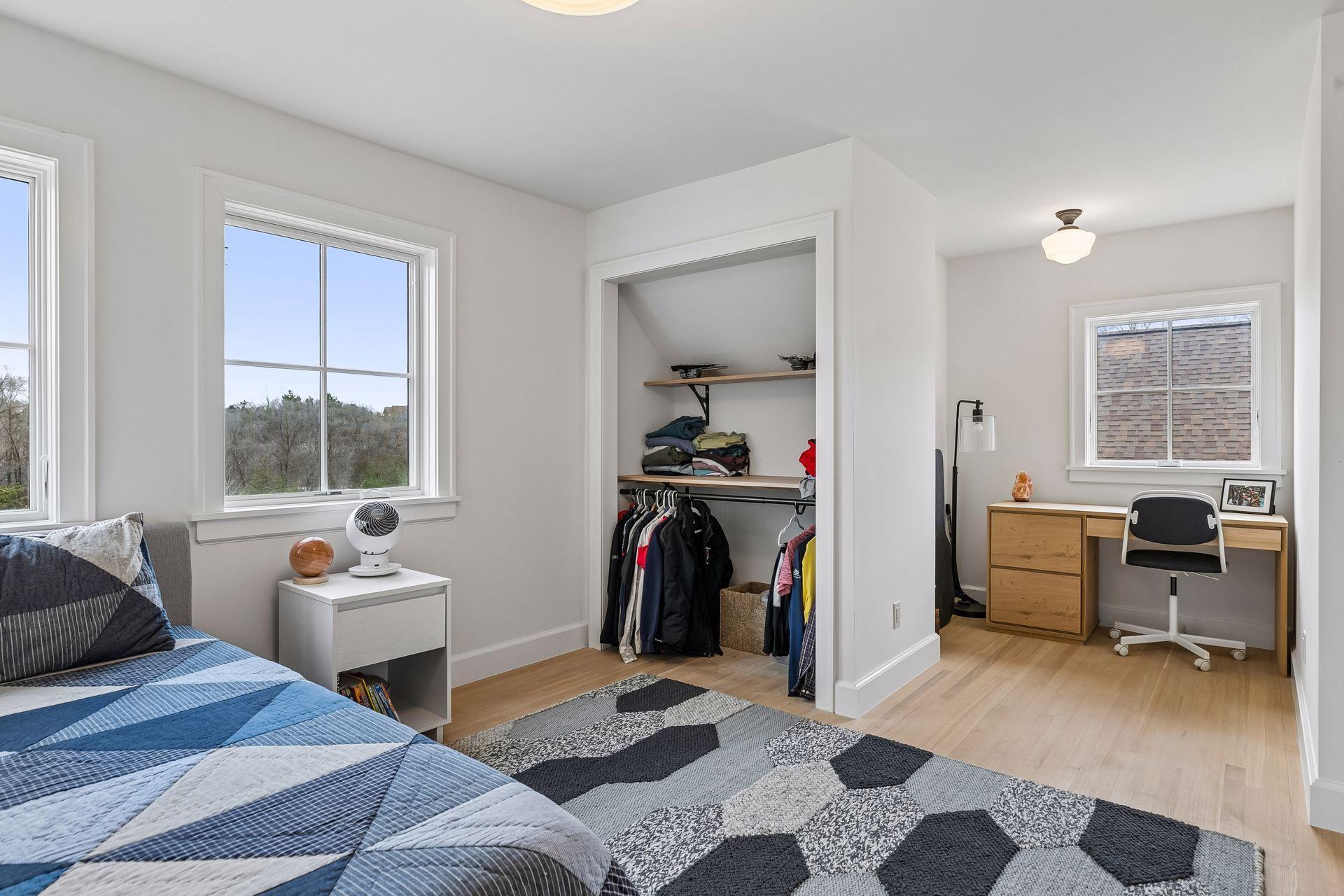 Alternate view of the bedroom, highlighting a cozy nook perfect for a desk, reading corner, or workspace.