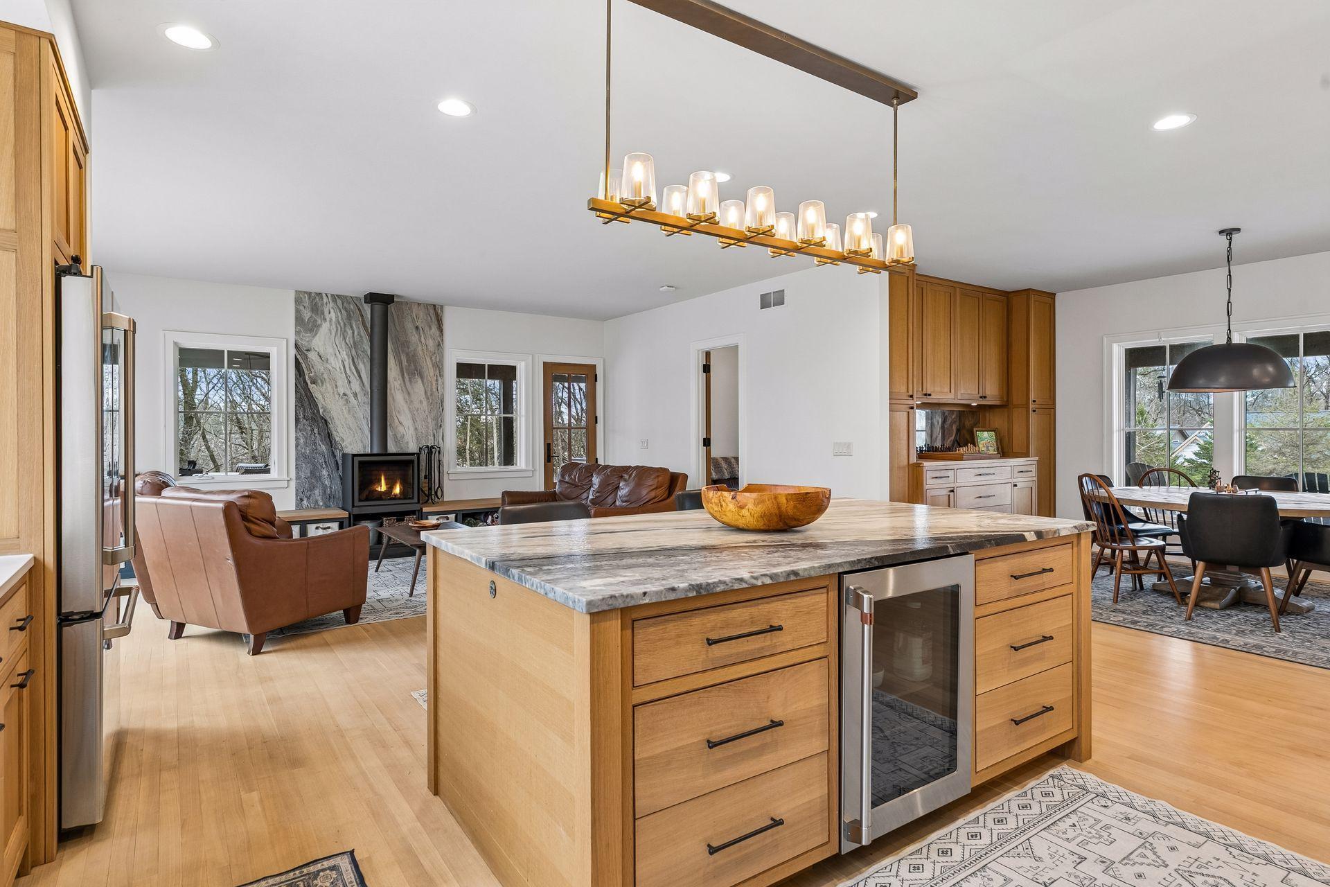 From the kitchen, enjoy seamless sightlines to the living and dining areas, creating an open, flowing space perfect for entertaining.