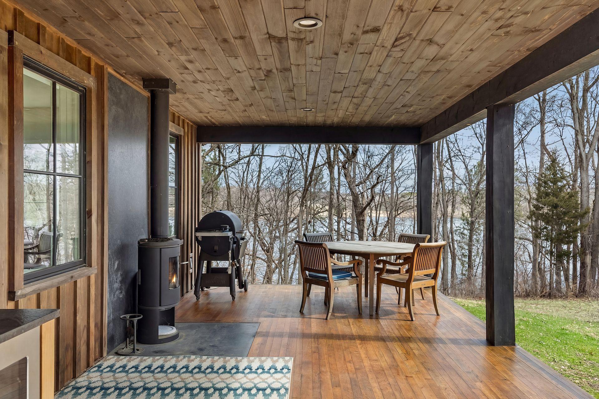 Cozy up to the wood burning stove or enjoy a cup of coffee while taking in the sights and sounds of beautiful Lake Edith!