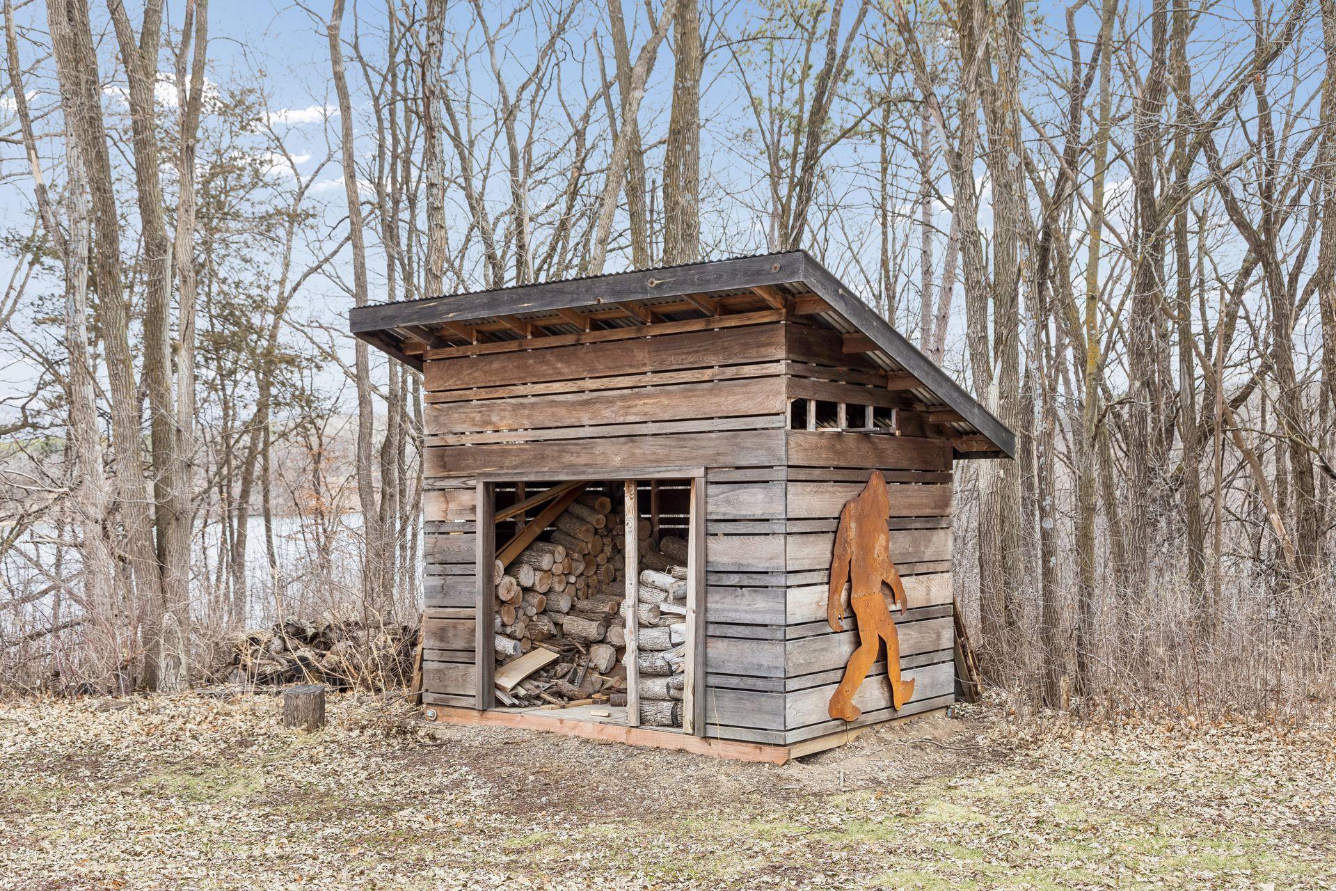 Large shed for wood storage.