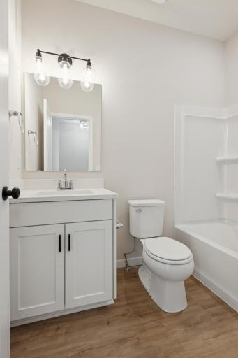 Full bath on the main level, perfect for guests or family use.