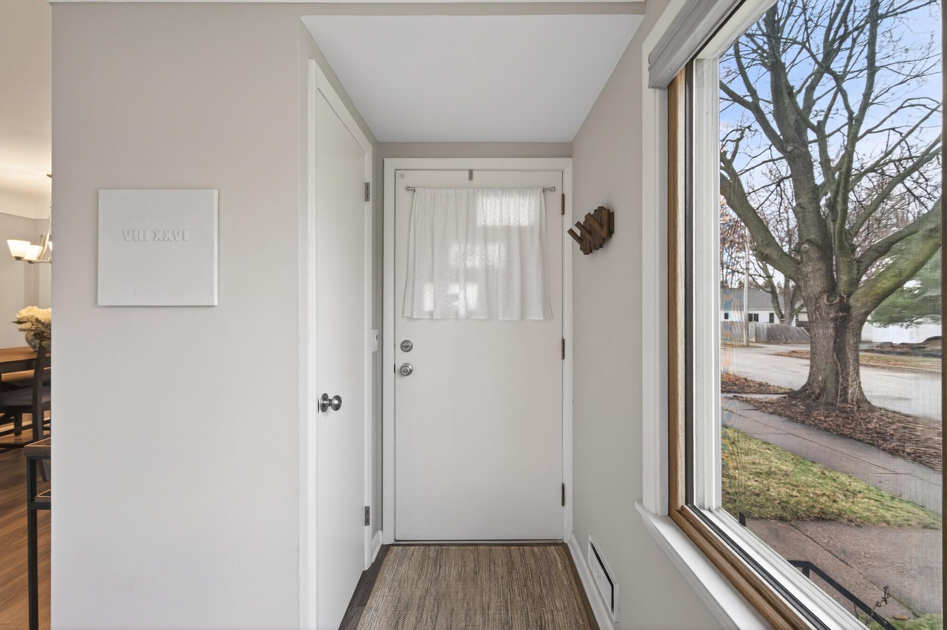 Front foyer with coat closet.