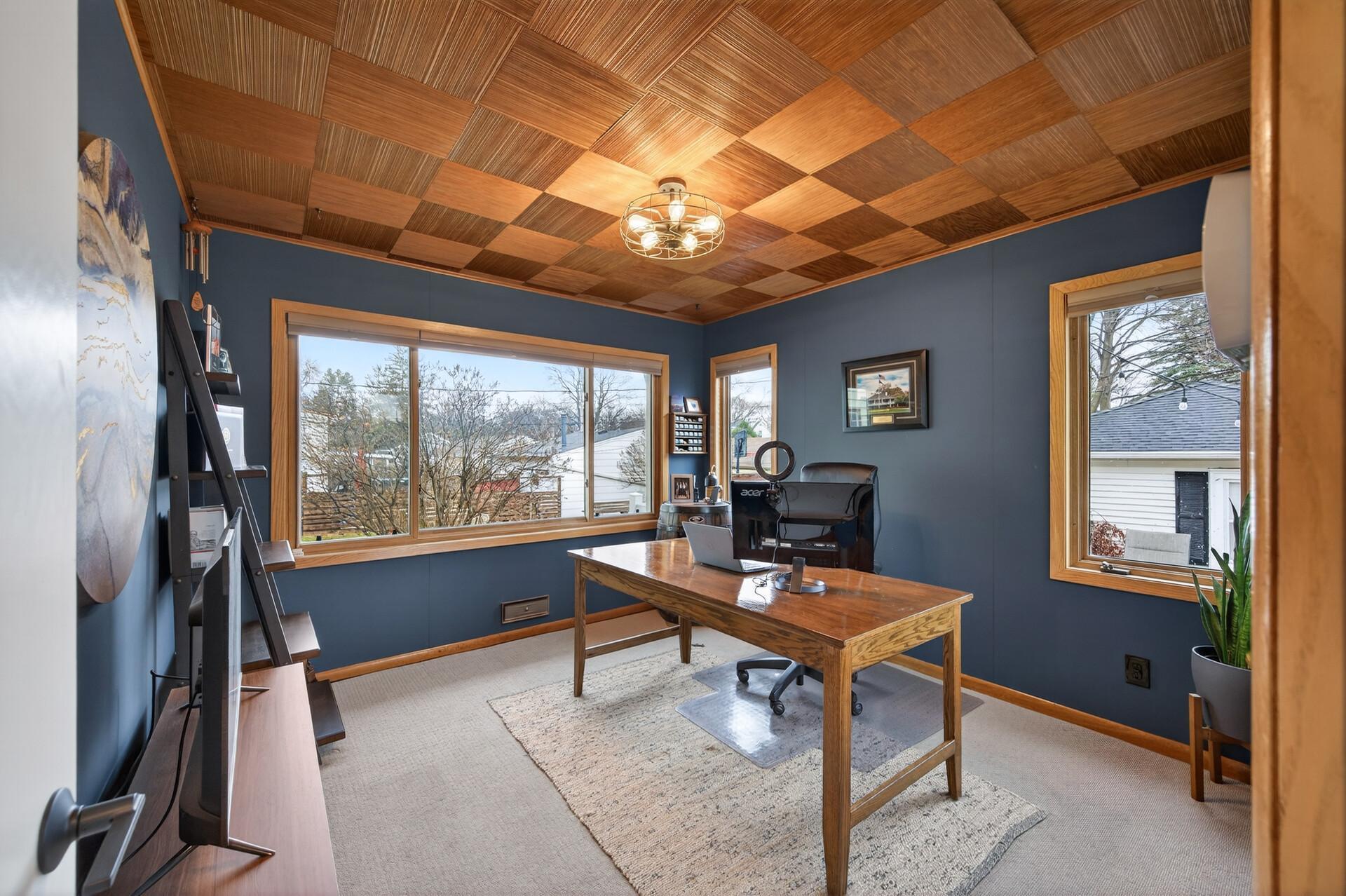 Versatile flex room—perfect for a home office, den, or sunroom.