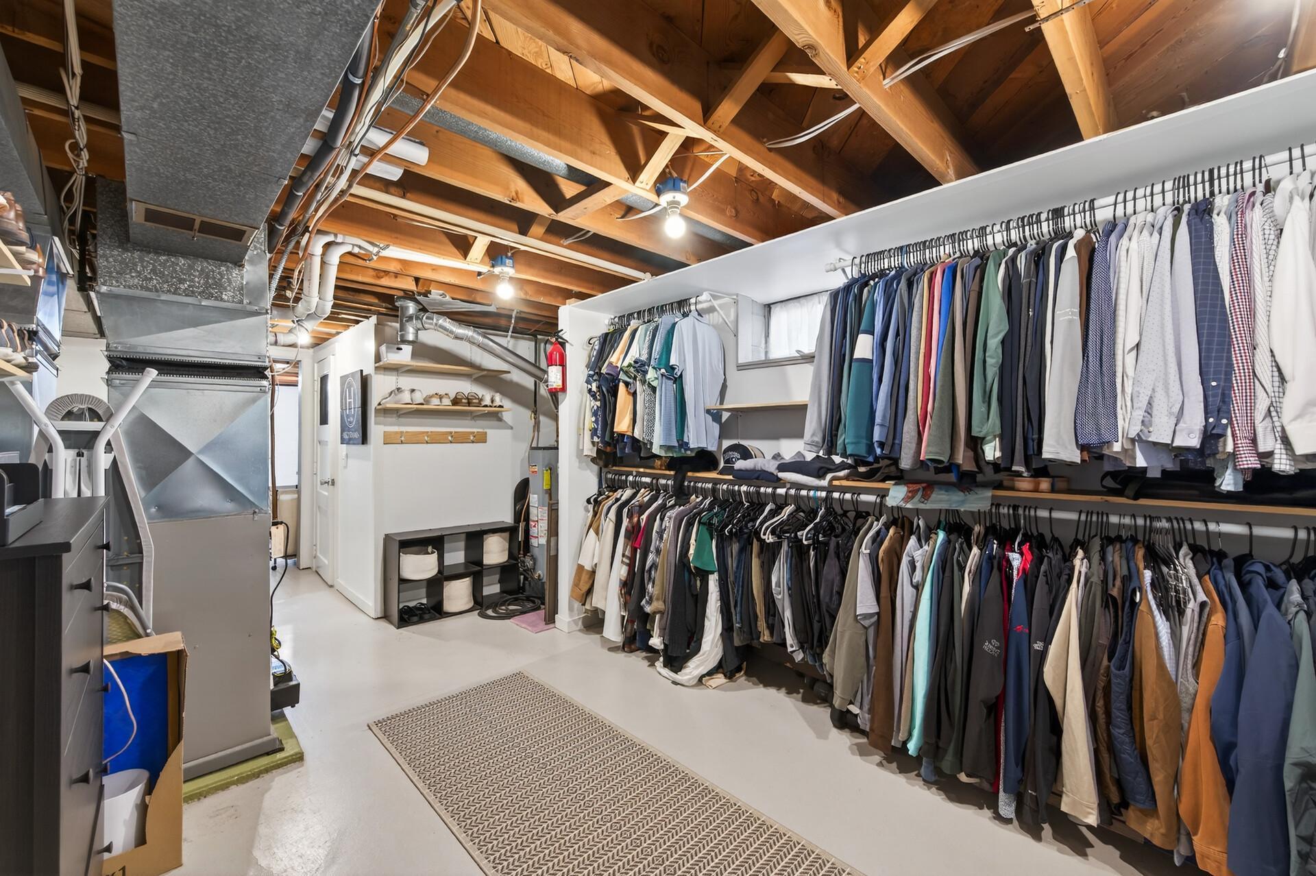 Large 2nd storage area set up as a closet/storage area.