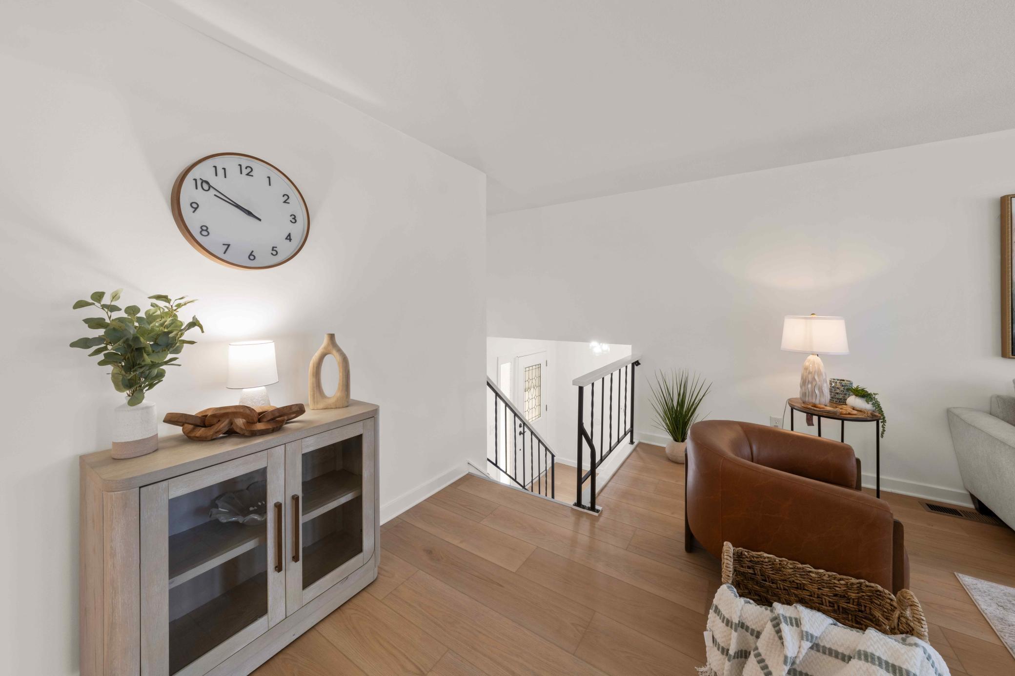 Upper level features 2 bedrooms and 1 full bathroom, with nice open layout and 3 season porch