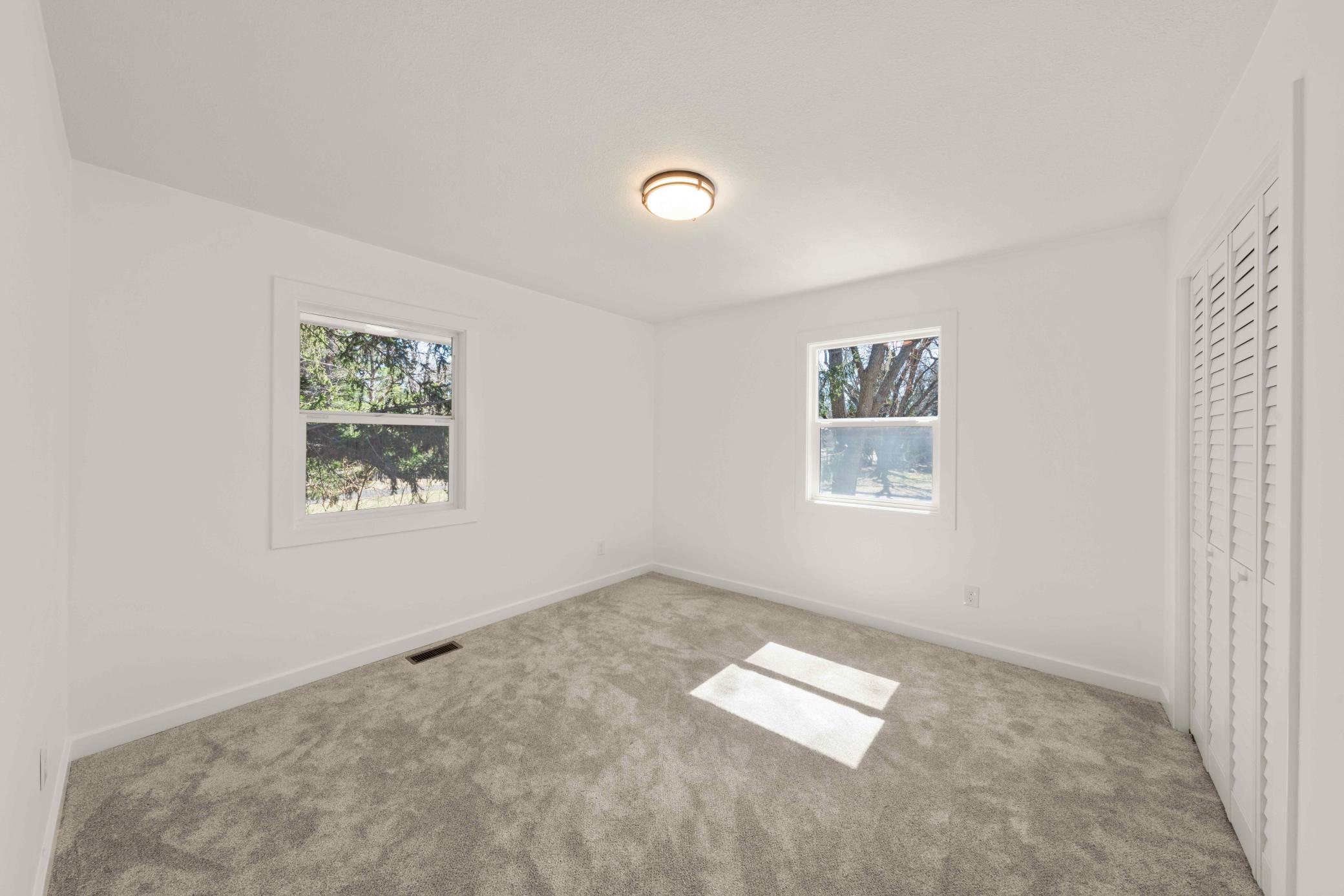 Bedroom 1 on upper level with lots of natural light