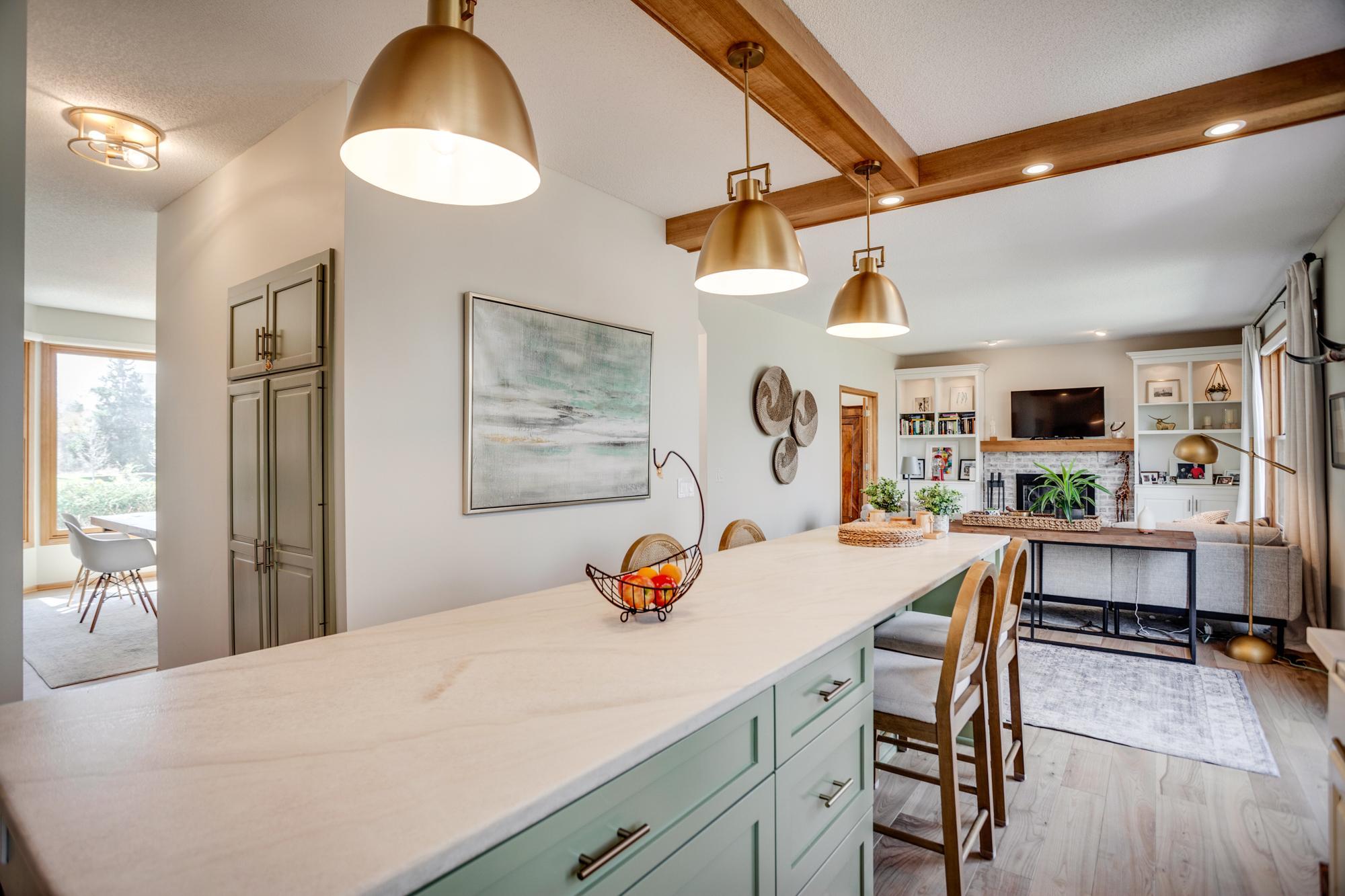 Thoughtful upgrades—including six built-in USB charging outlets—enhance everyday convenience in this beautifully designed, highly functional kitchen.