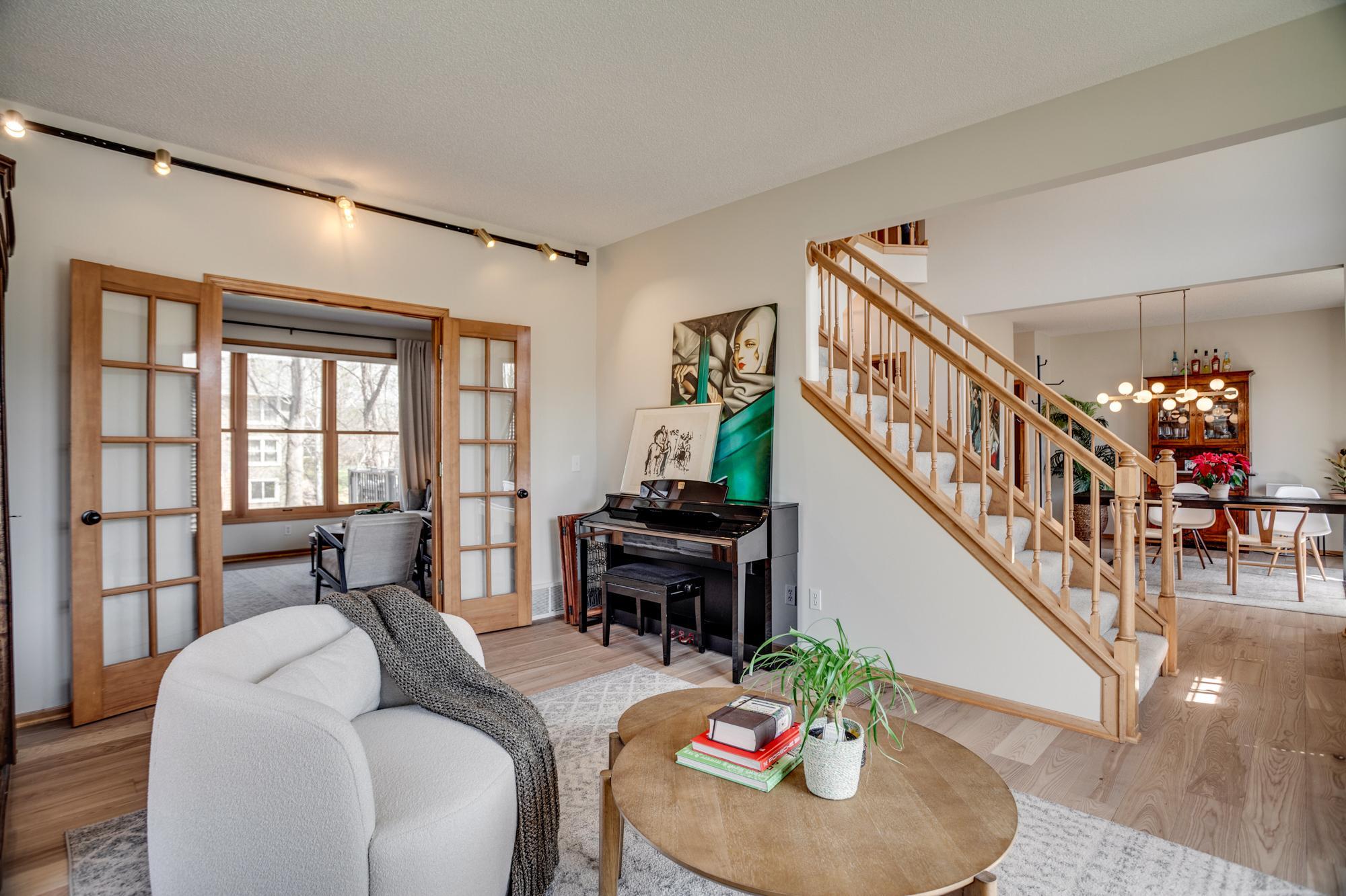 The home showcases a timeless design offering both formal and everyday gathering areas creating versatile spaces for seamless entertaining.