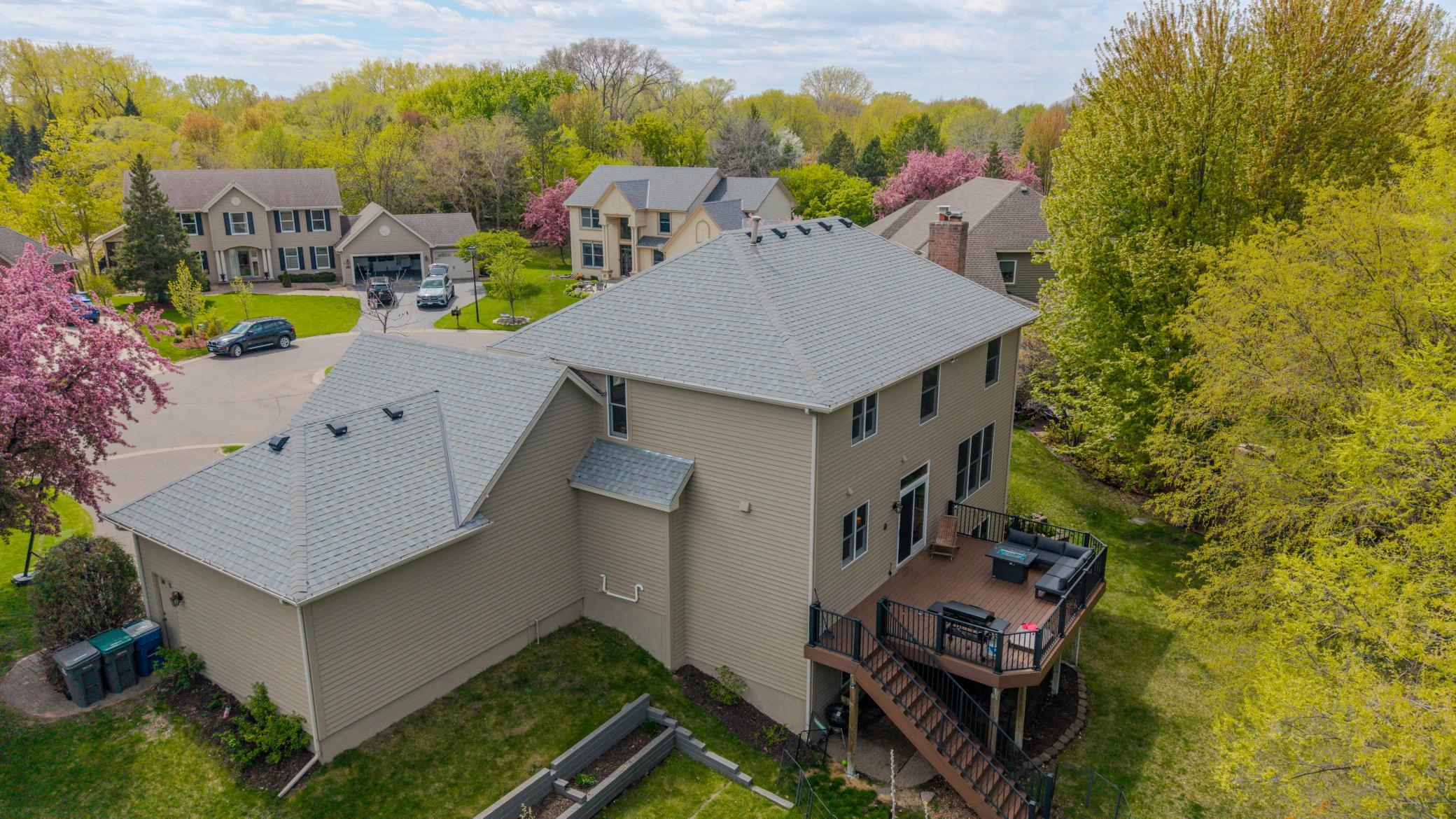 Outstanding location, Wayzata schools, tranquil pond views, and incredible updates both inside and outside...brand new roof (May 2026), + remodeled/updated kitchen, baths, flooring, and lighting! This home has it all!