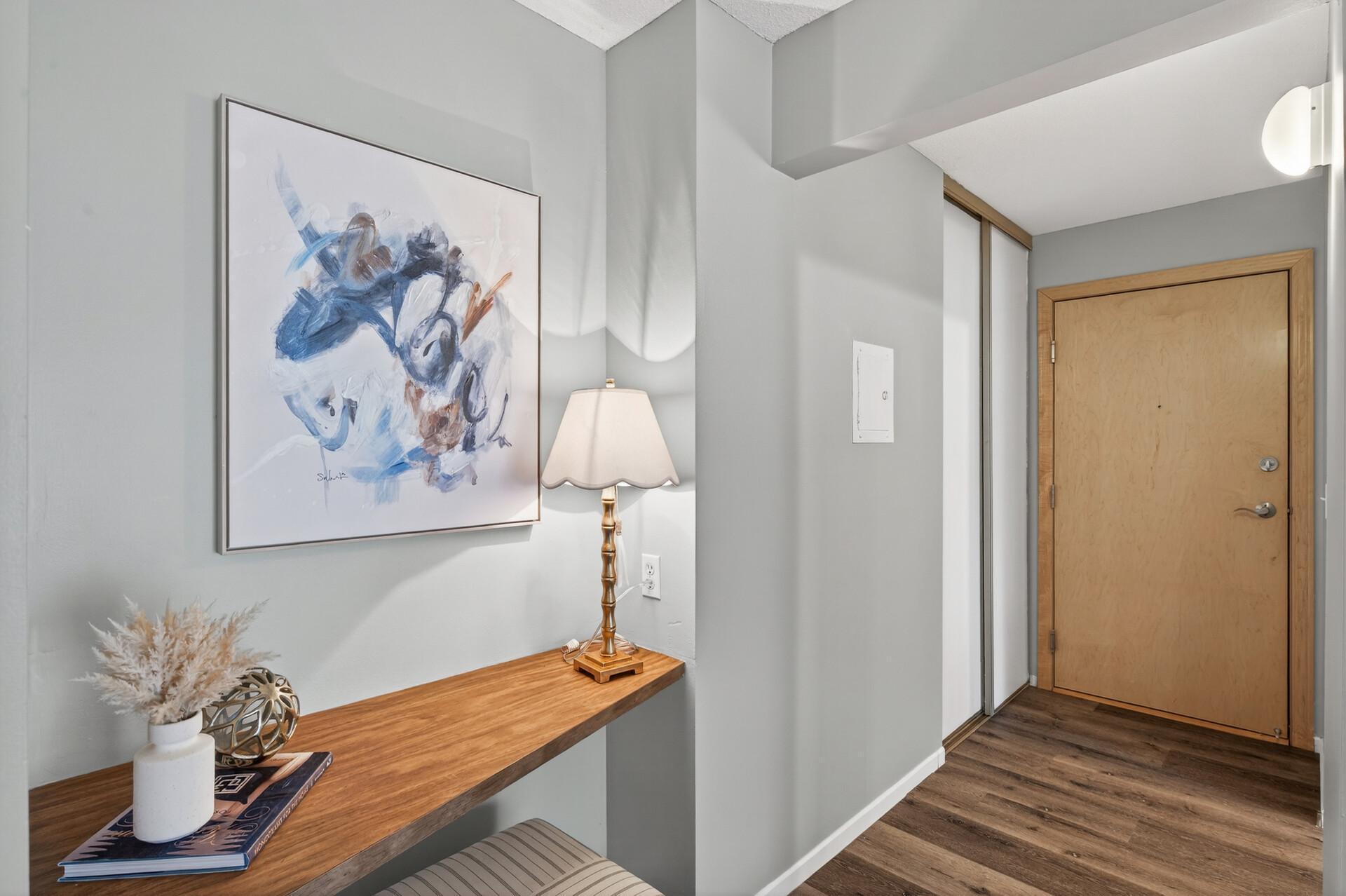 The entry from inside the building has a spacious coat closet