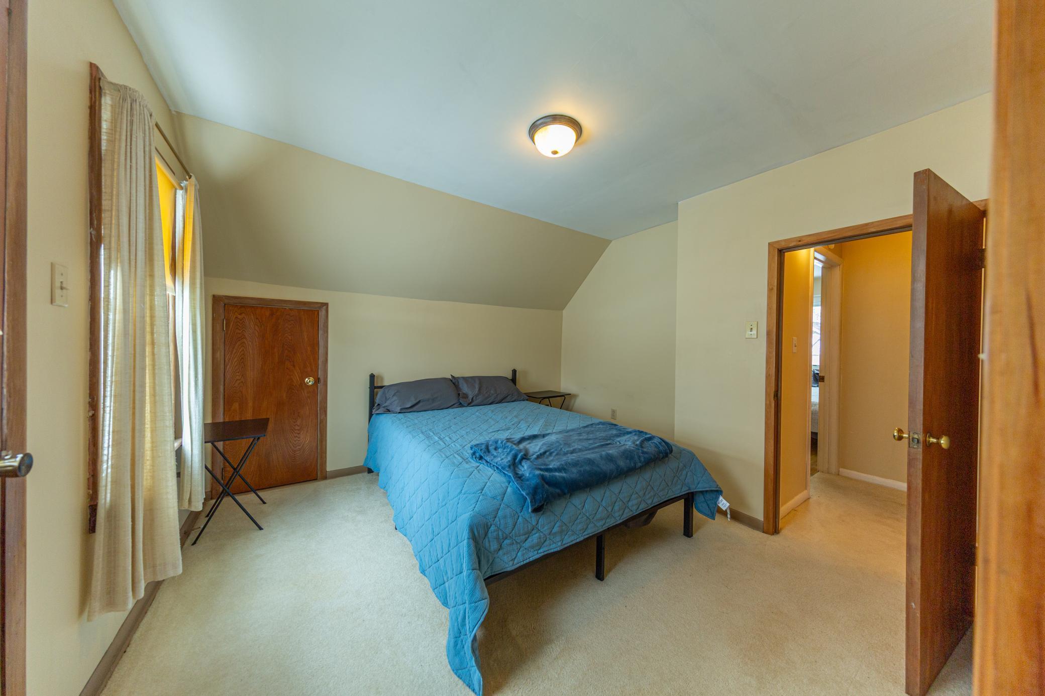 1 of 2 upper level bedrooms