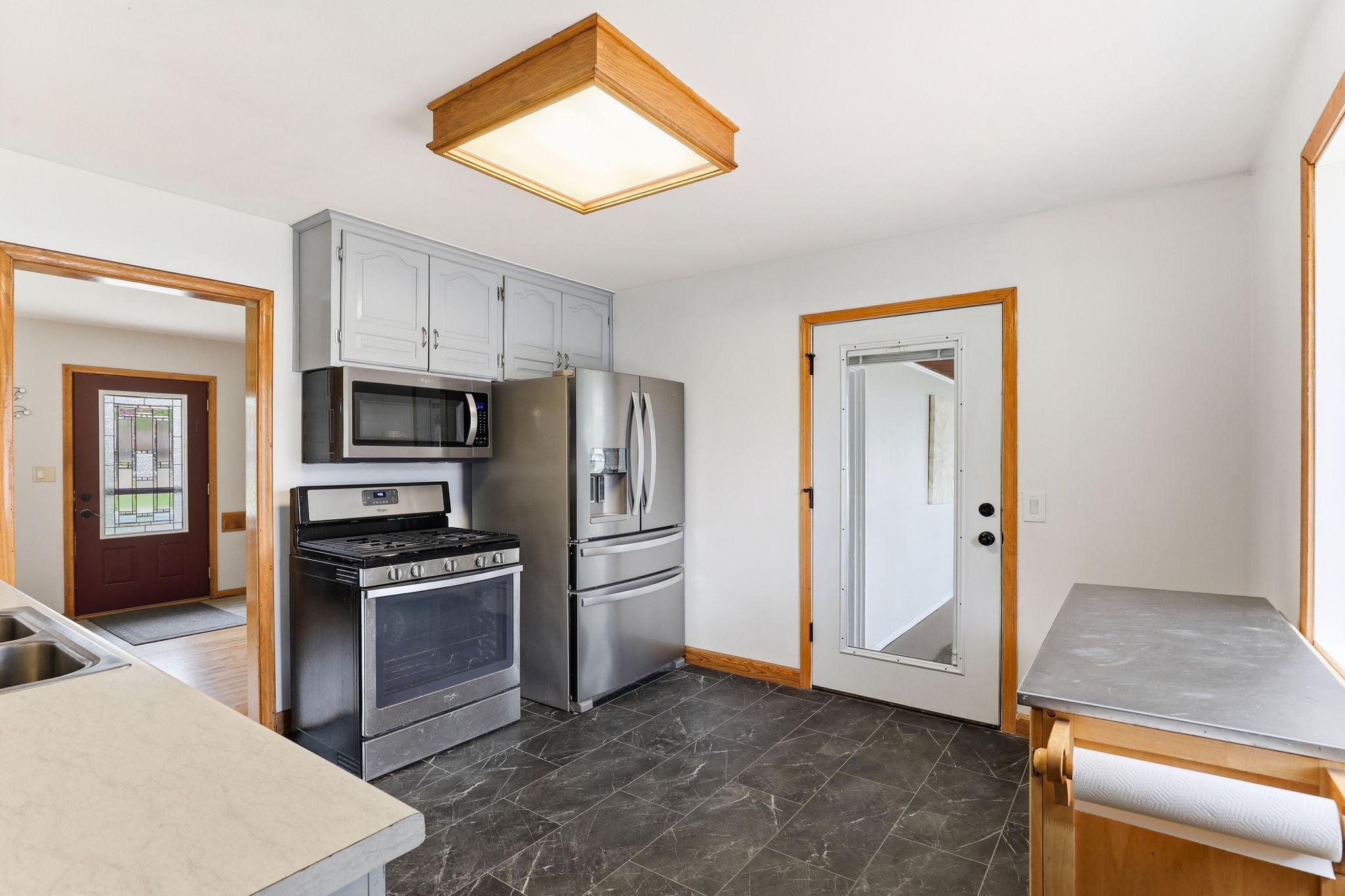 Direct access to the backyard. Easy transition from indoor cooking to outdoor dining and entertaining.