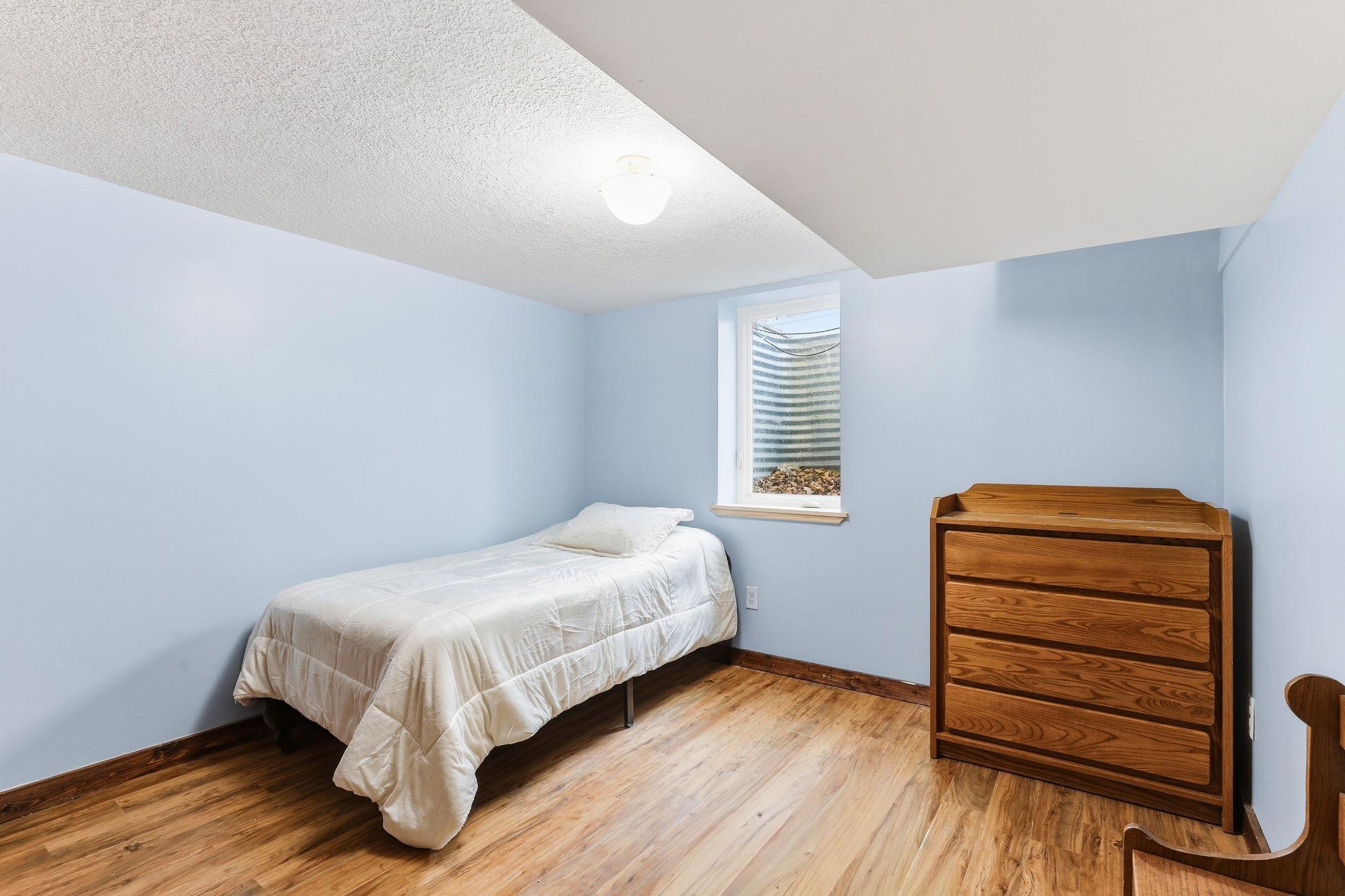 Updated lower-level bedrooms with new LPV flooring (2021 and a newly added egress windows (2018). The improvements enhance natural light, safety, and overall livability.