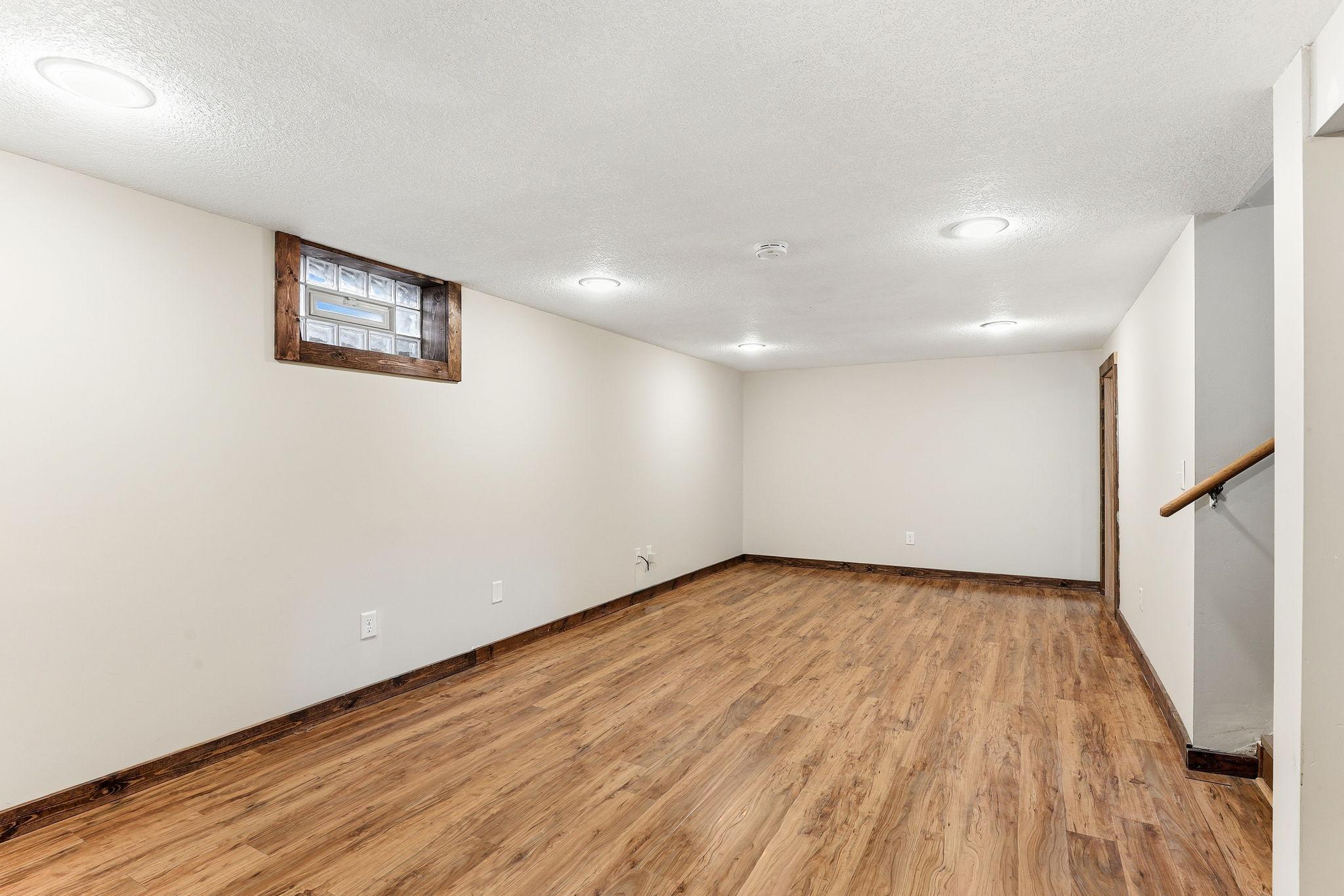 NEW LPV flooring(2021) throughout the lower level provides the beauty of hardwood with exceptional durability.