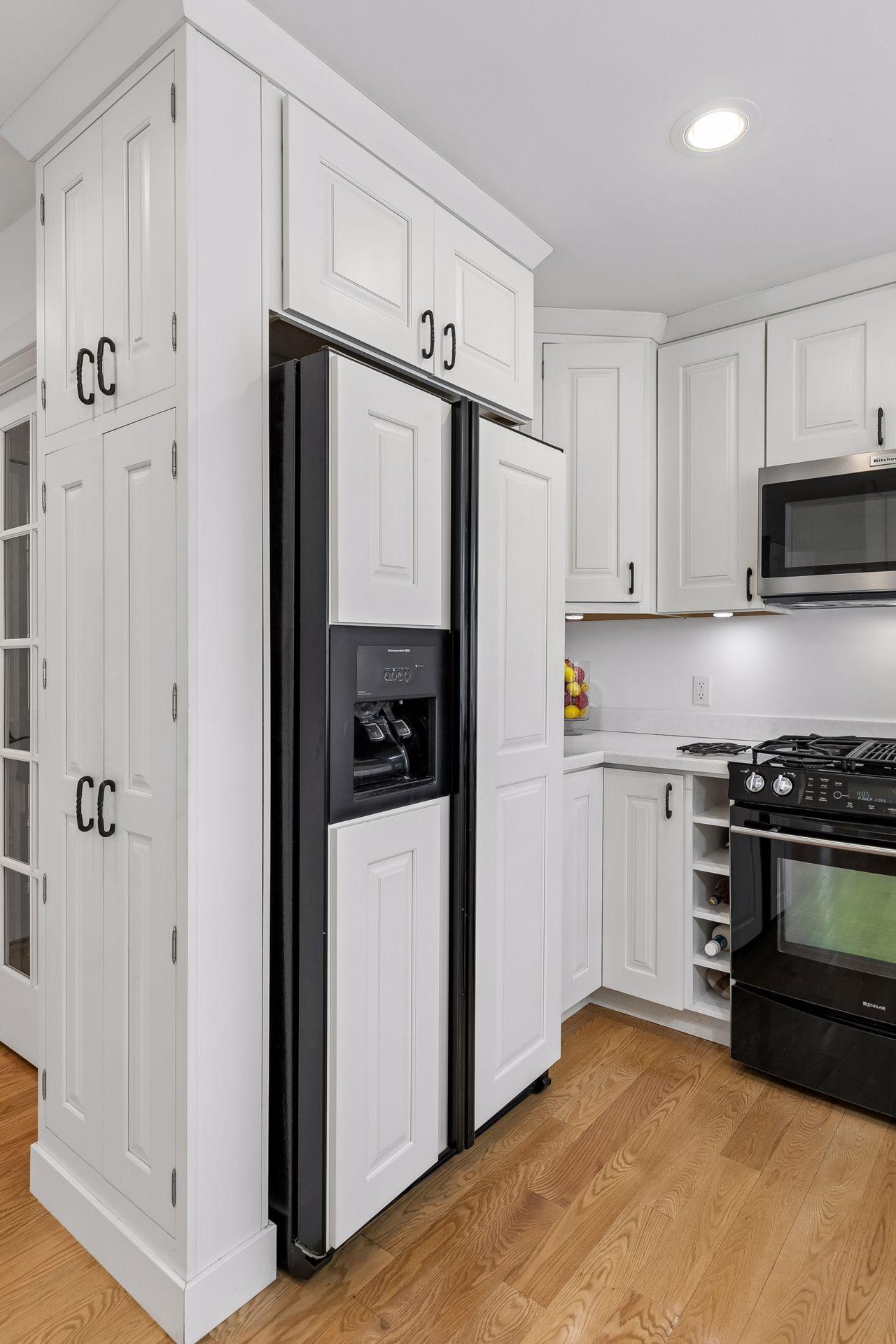 To the ceiling cabinetry