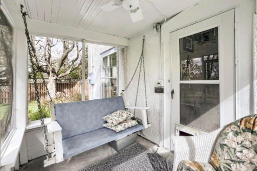 Screened in porch with swing!