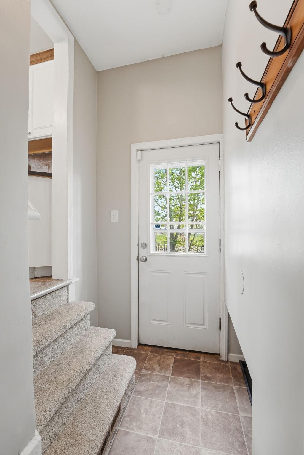 Landing from kitchen to basement