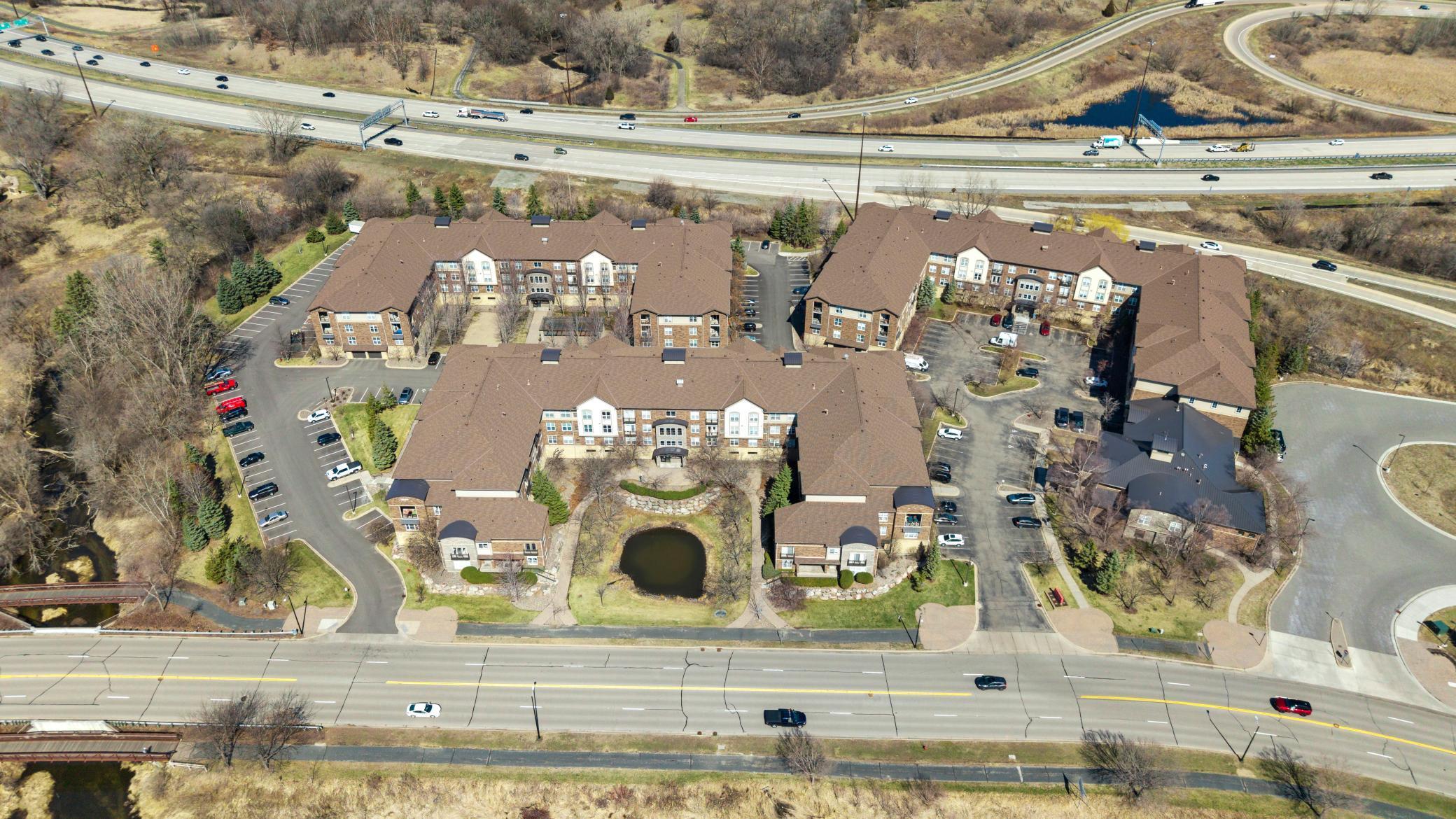 Another view of the front of 13570 Technology Dr., Unit 2221 is located in the back left building.