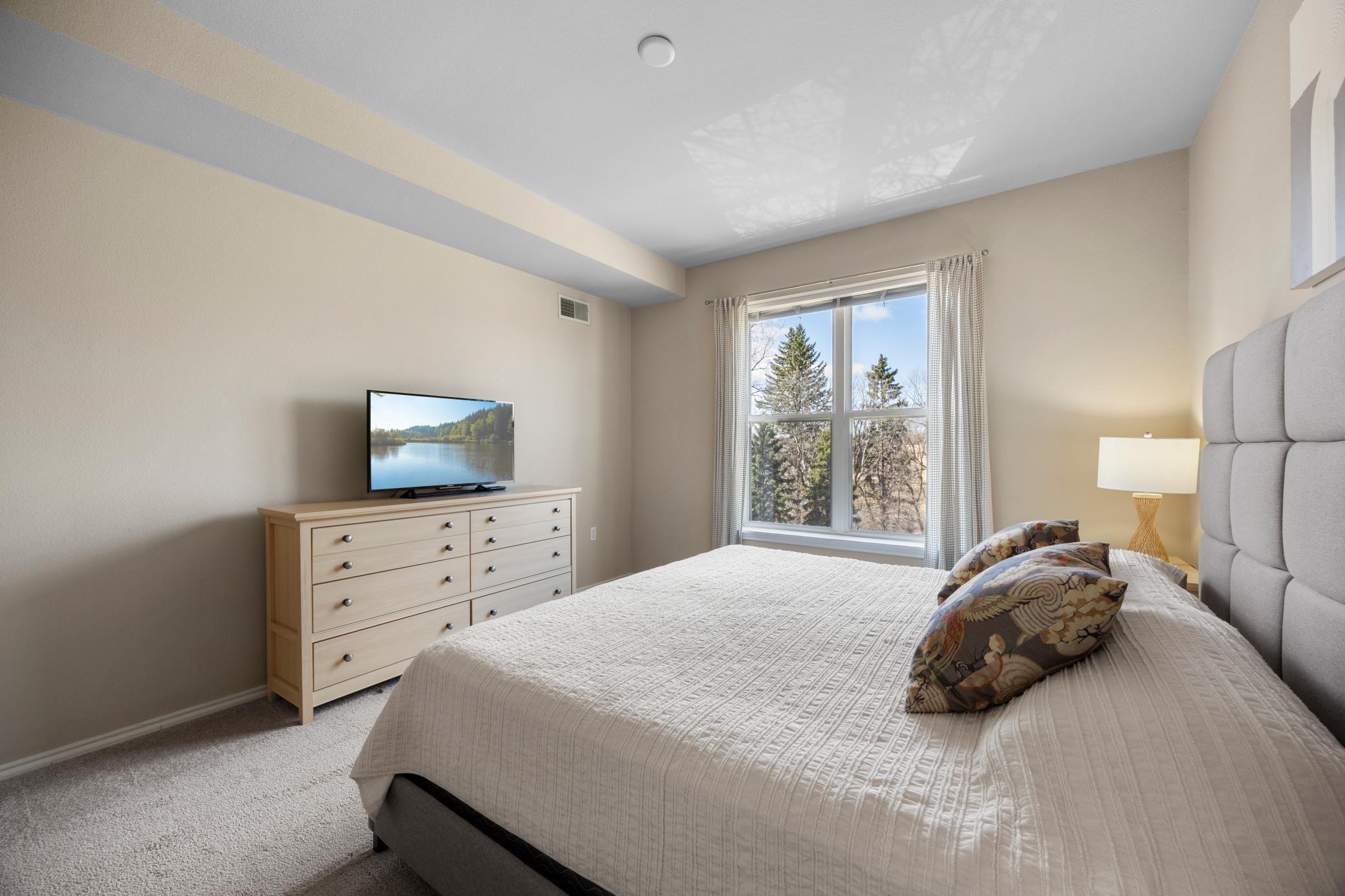 Looking into bedroom from closet