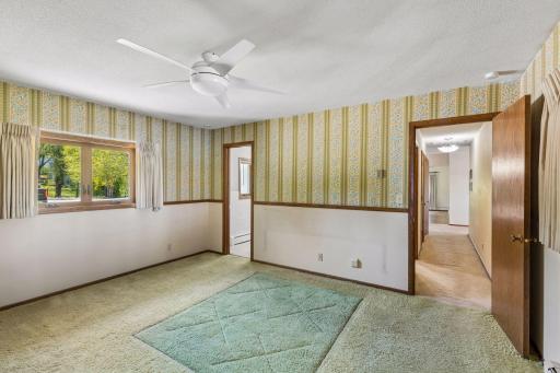 Primary bedroom with 1/2 bath on main floor
