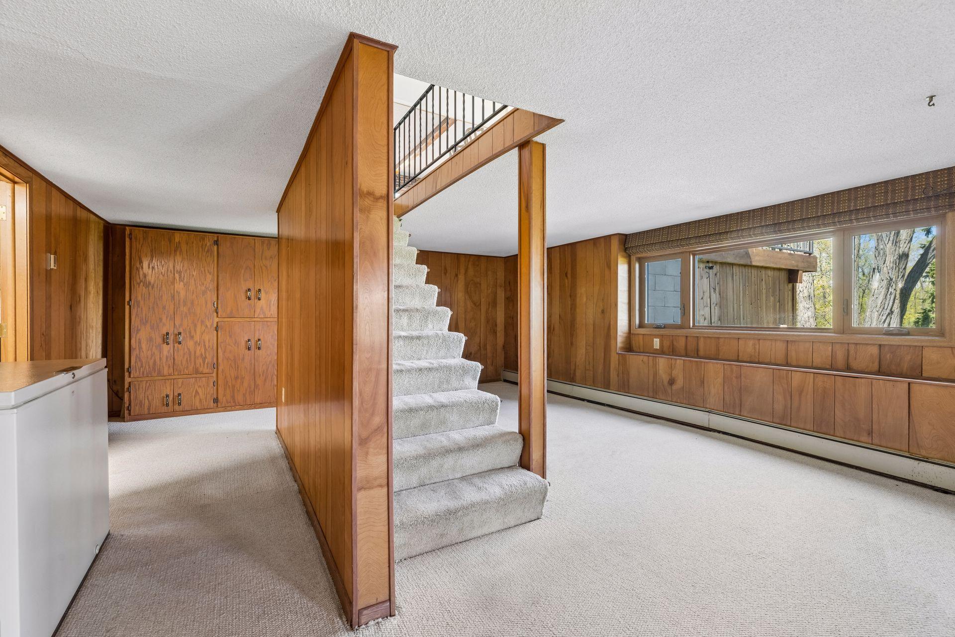 Lower-level Flex Room with views of lake