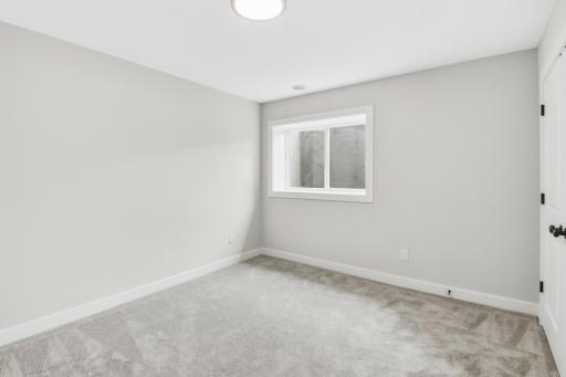 LL Bedroom, arge, bright and ready to be living in.
