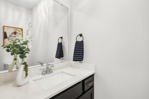 1/2 Bath-Main floor. Details of this custom build are noted thorughout this home.