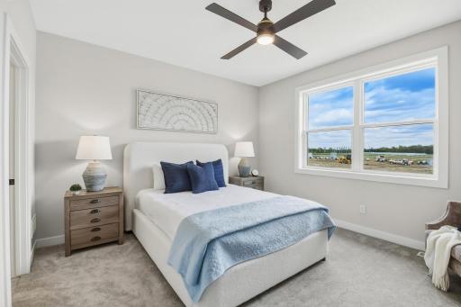 Main Flr-Primary Bedroom features tray vault ceiling.