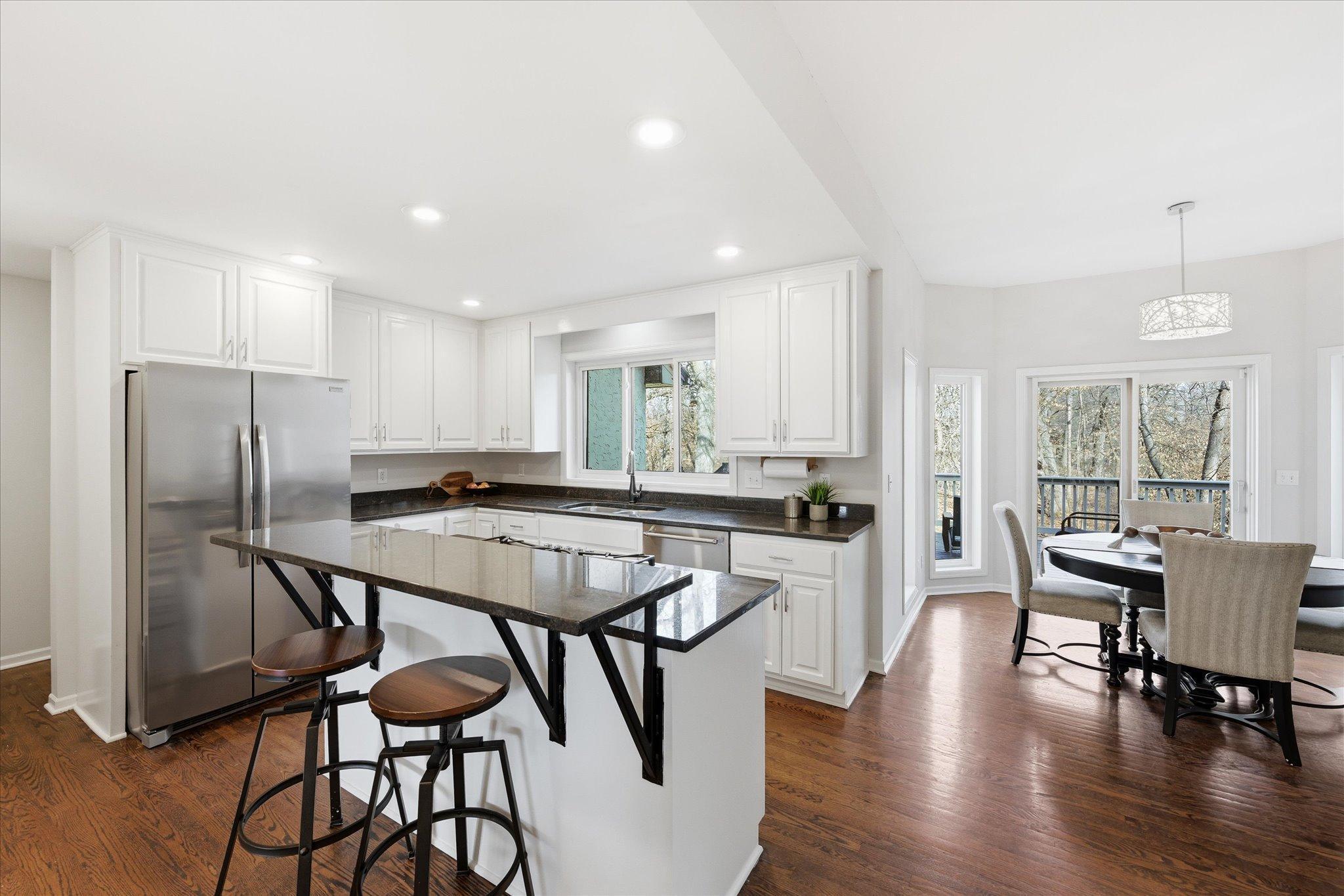 Gourmet kitchen with stunning views all around.