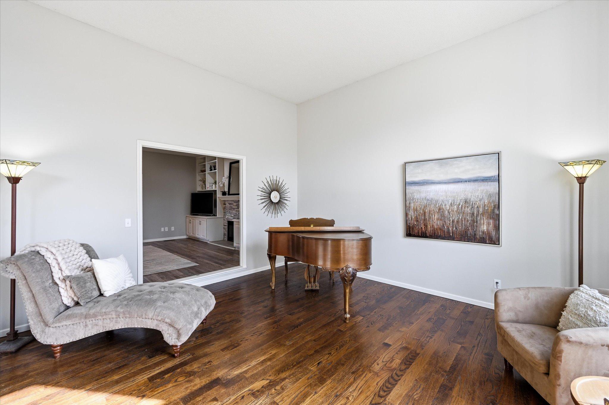 Living room leads to the main floor family room.