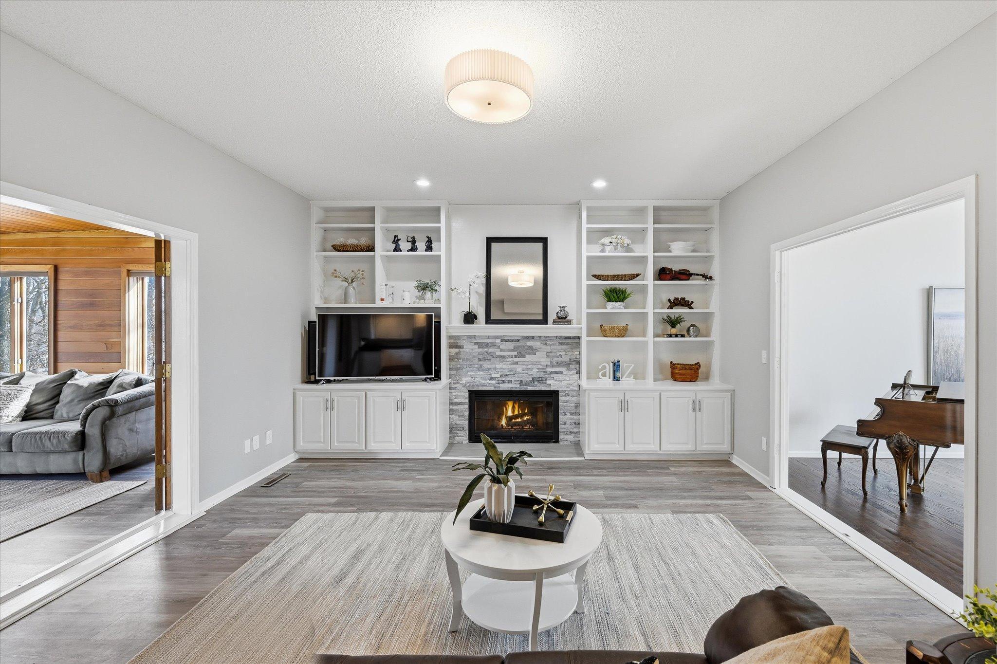 Main floor family room steps from the kitchen and four season room for easy entertaining