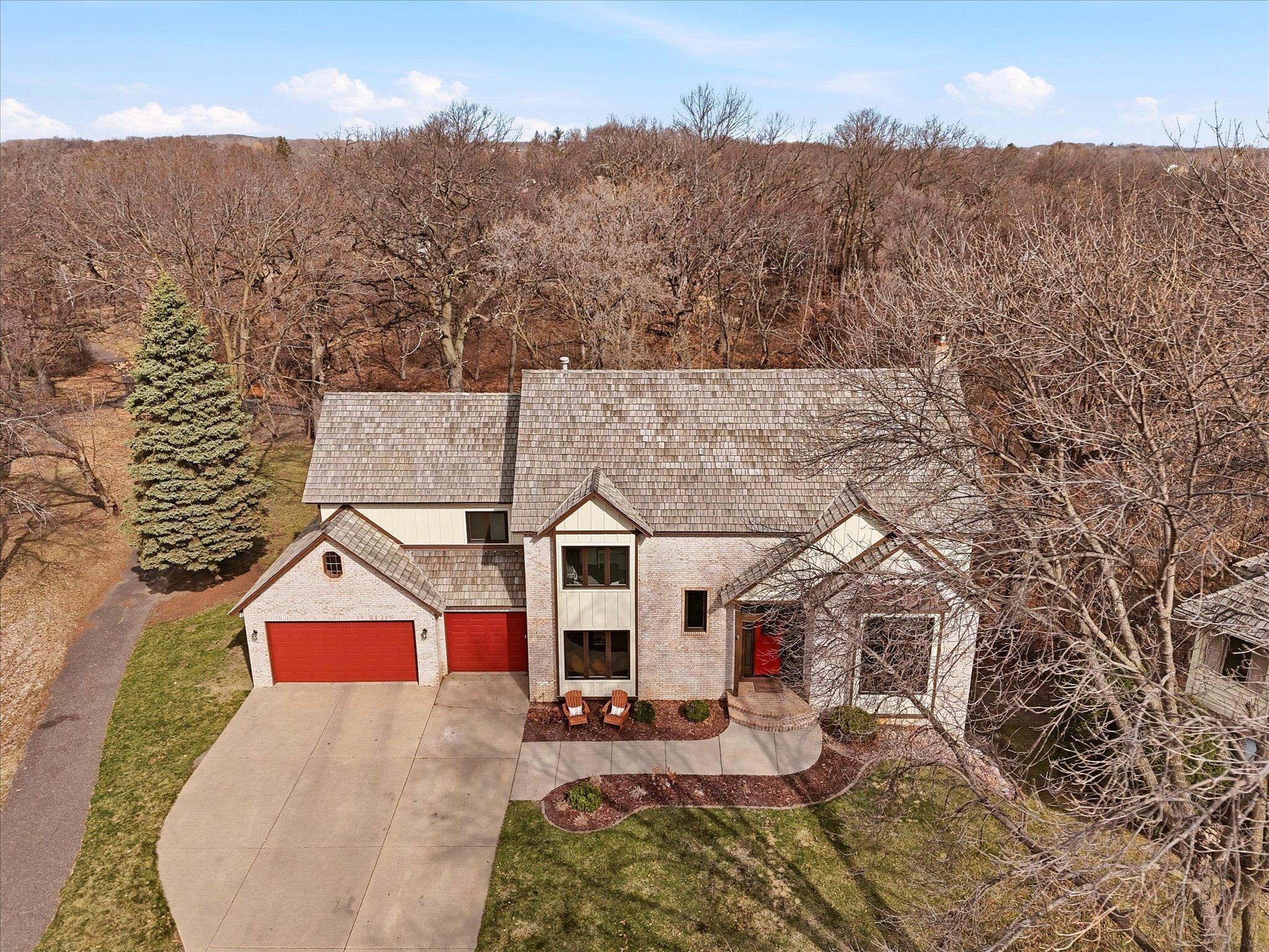 The entire front of home has been remodeled with stone and board and batten. Roof was replaced as well as most windows.