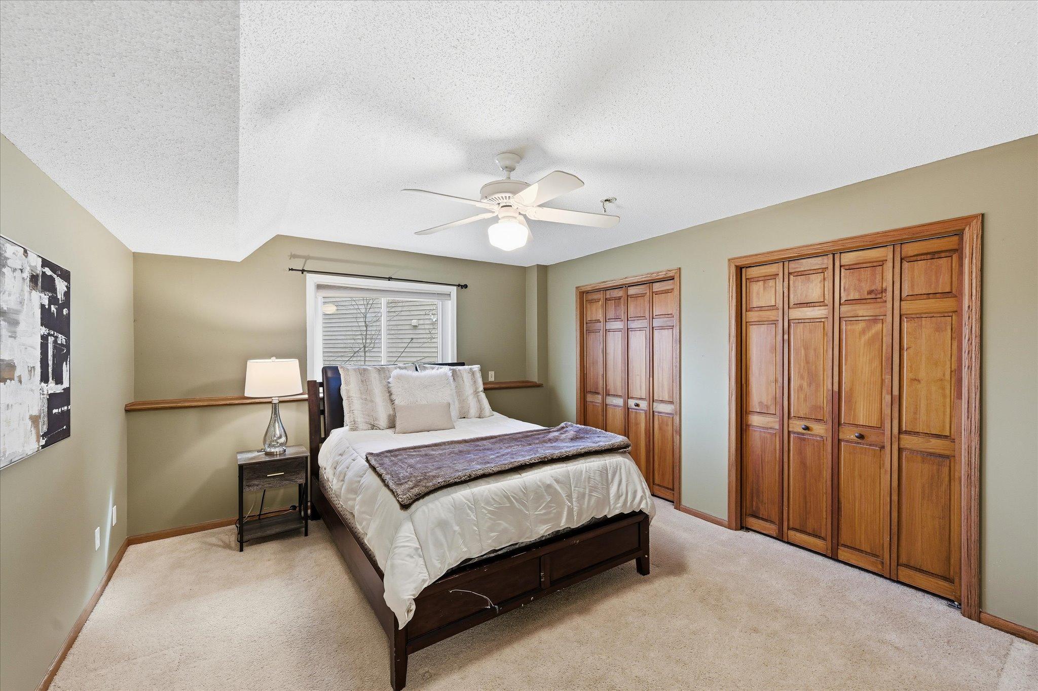 Lower level giant bedroom with plenty of closet space.