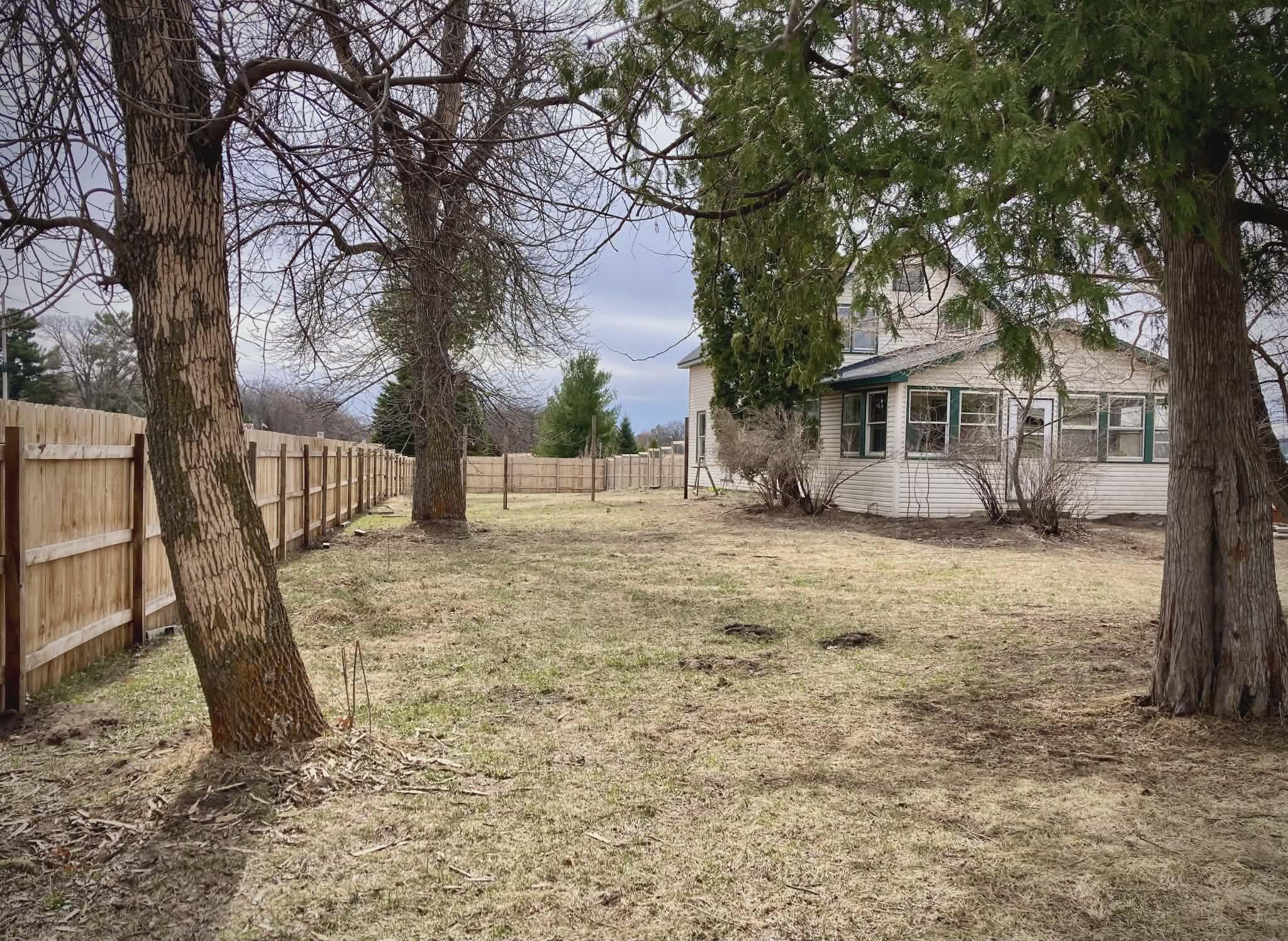 Privacy fence on three sides of the property ~ Photo kindly provided by the seller.