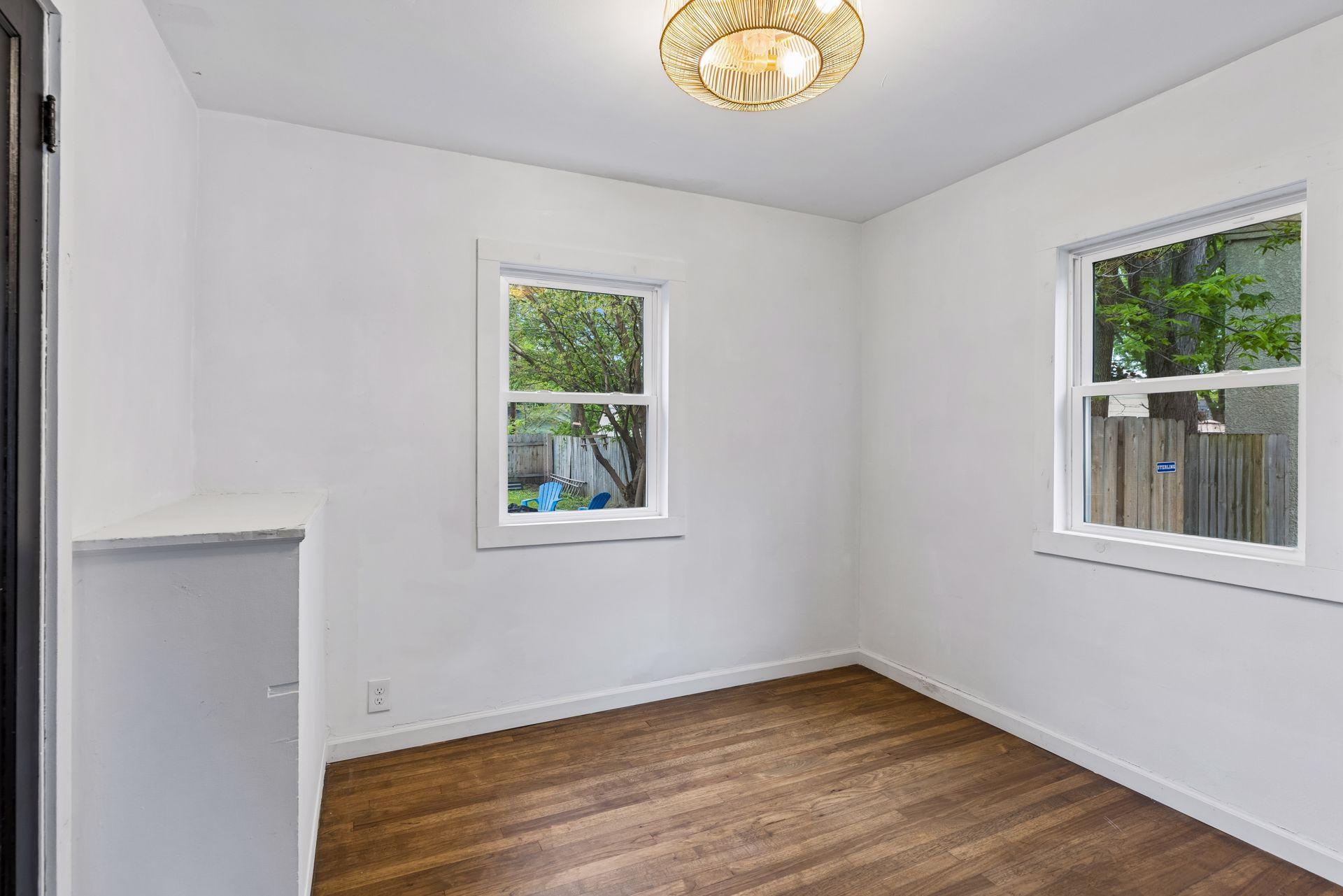 Main floor bedroom with new lighting.