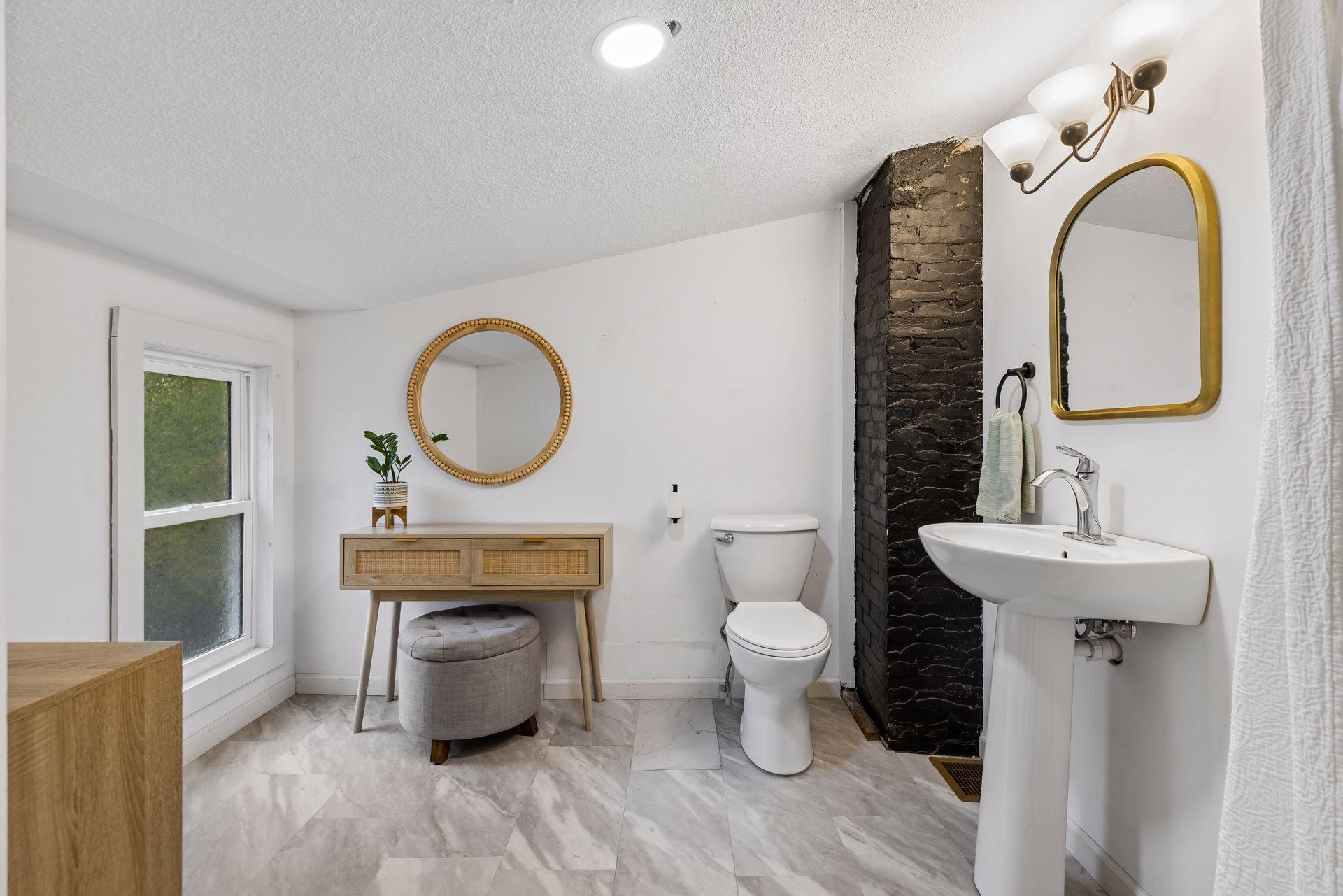 Private owners bath with walk-in tiled shower.