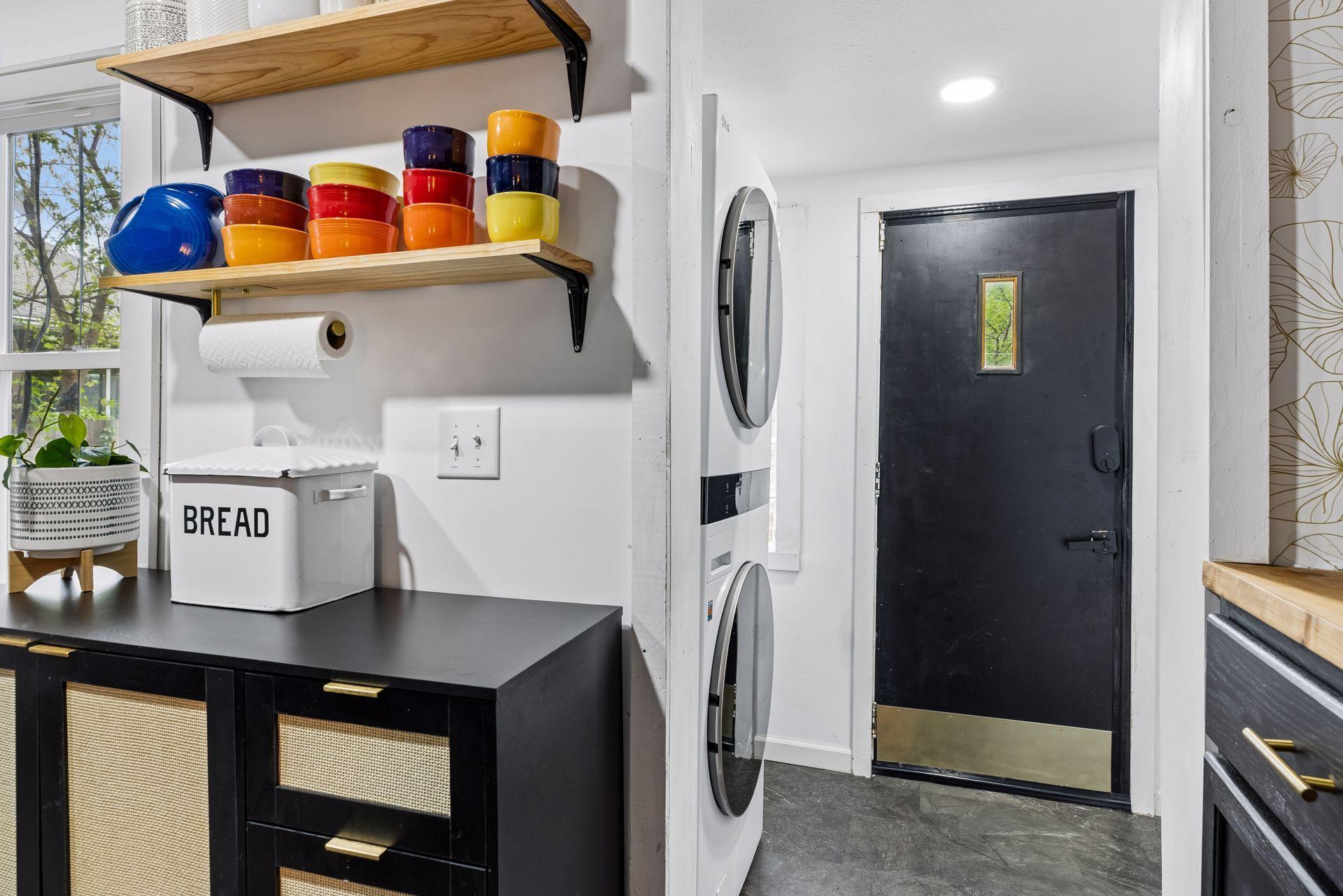 Rear entry/walkout with adjacent laundry - stackable washer/dryer 2024.