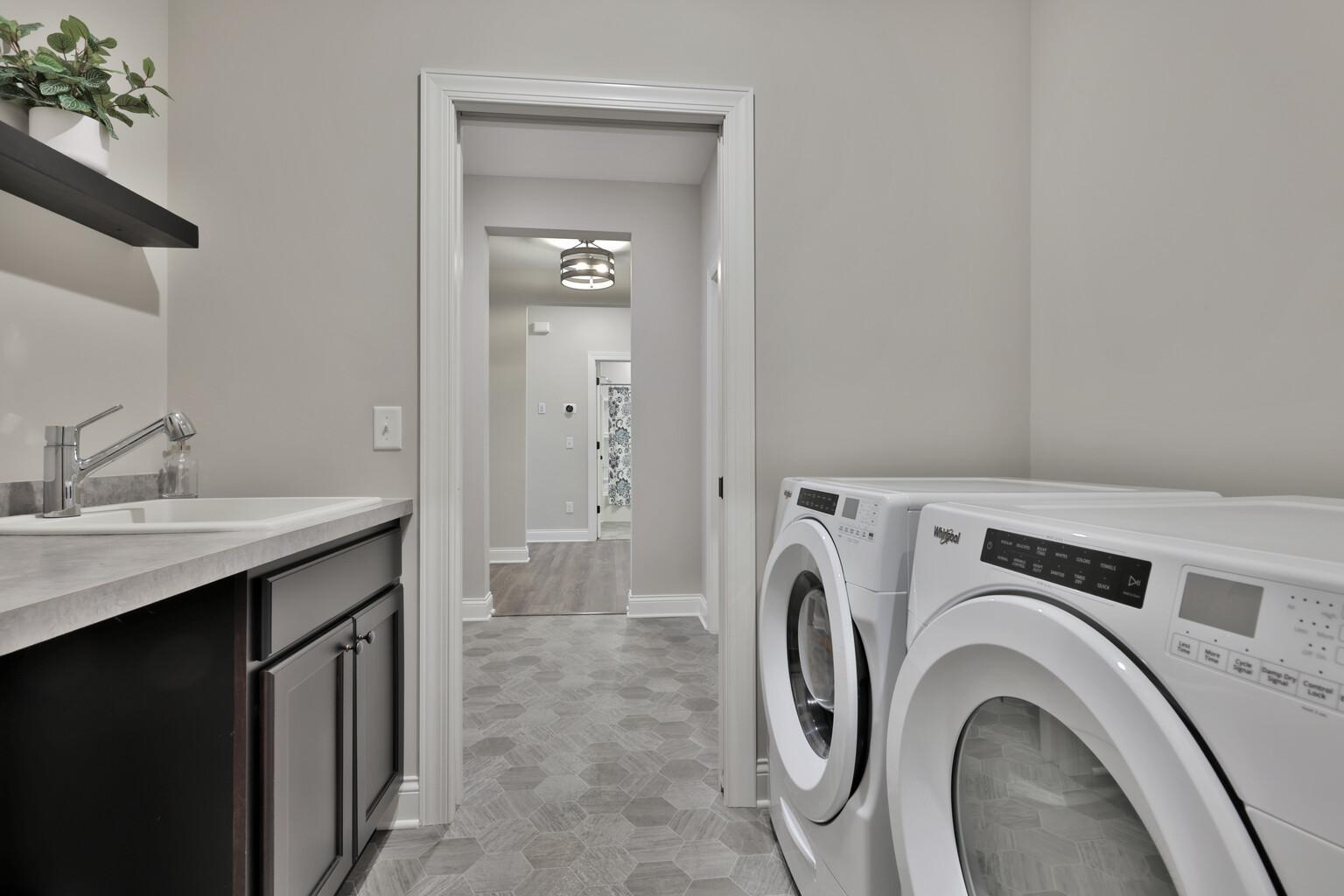 Convenient main level laundry room off primary